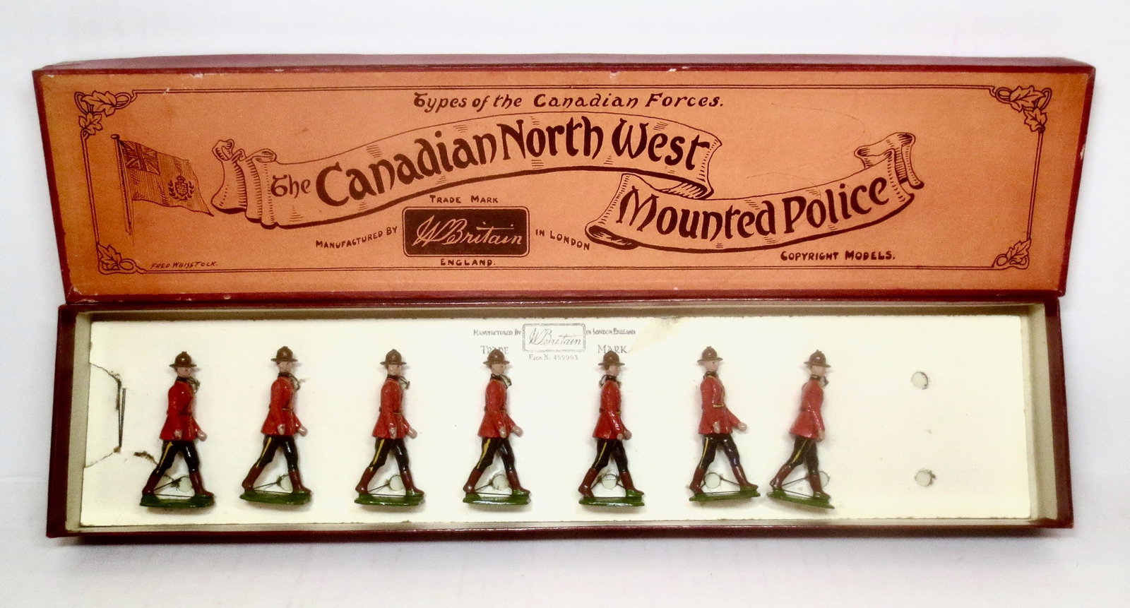 Britains #1554 Royal Canadian Mounted Police: First version, circa 1937. 7 pieces (one missing). Mint to near mint condition. Whisstock label box in very good condition.