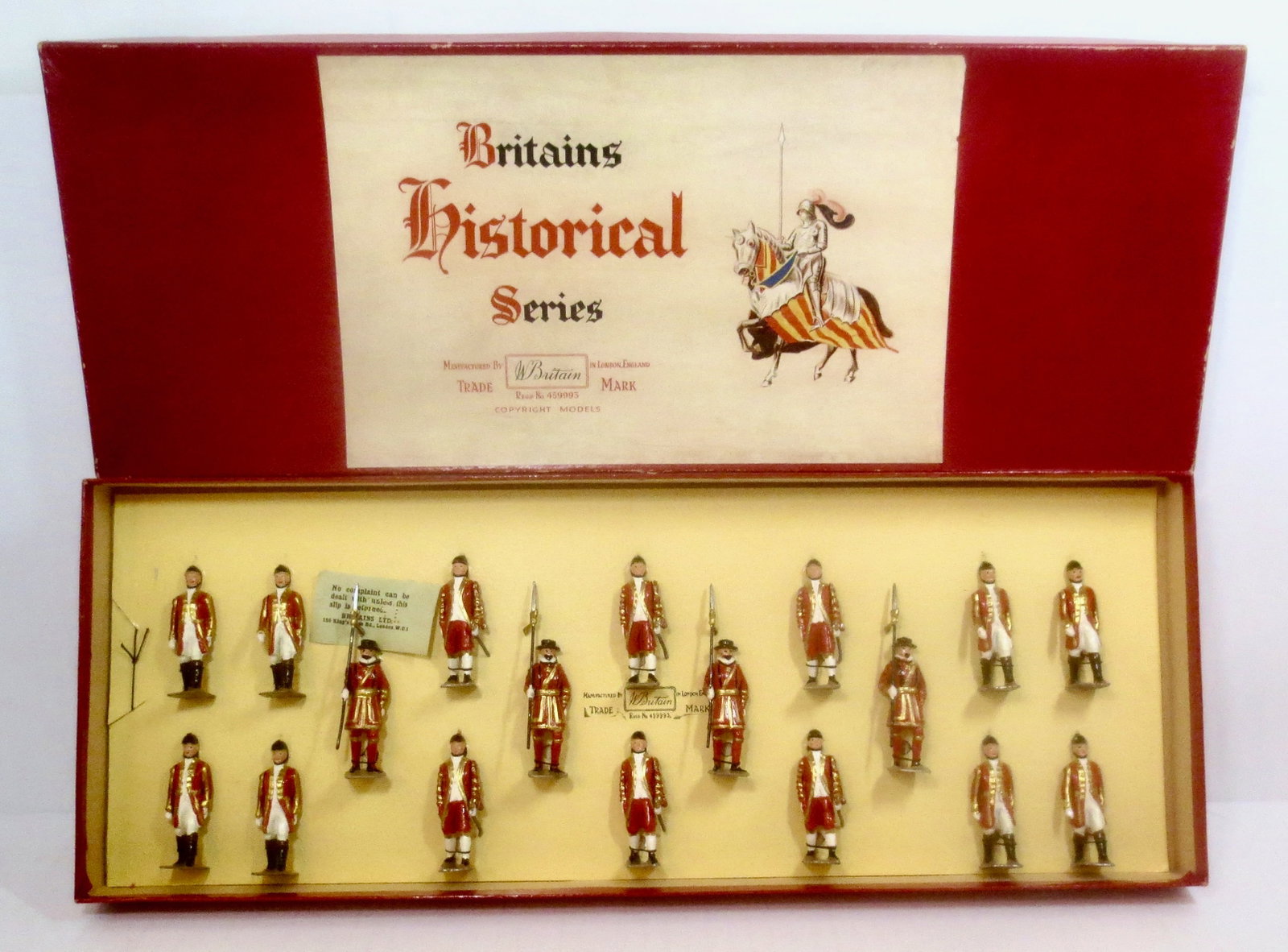 Britains #1475 Royal Household Display Set: Post war issue. Beefeaters, Outriders, and Footmen. 18 pieces. Mint, tied in the box condition. Box very good (one top corner split).