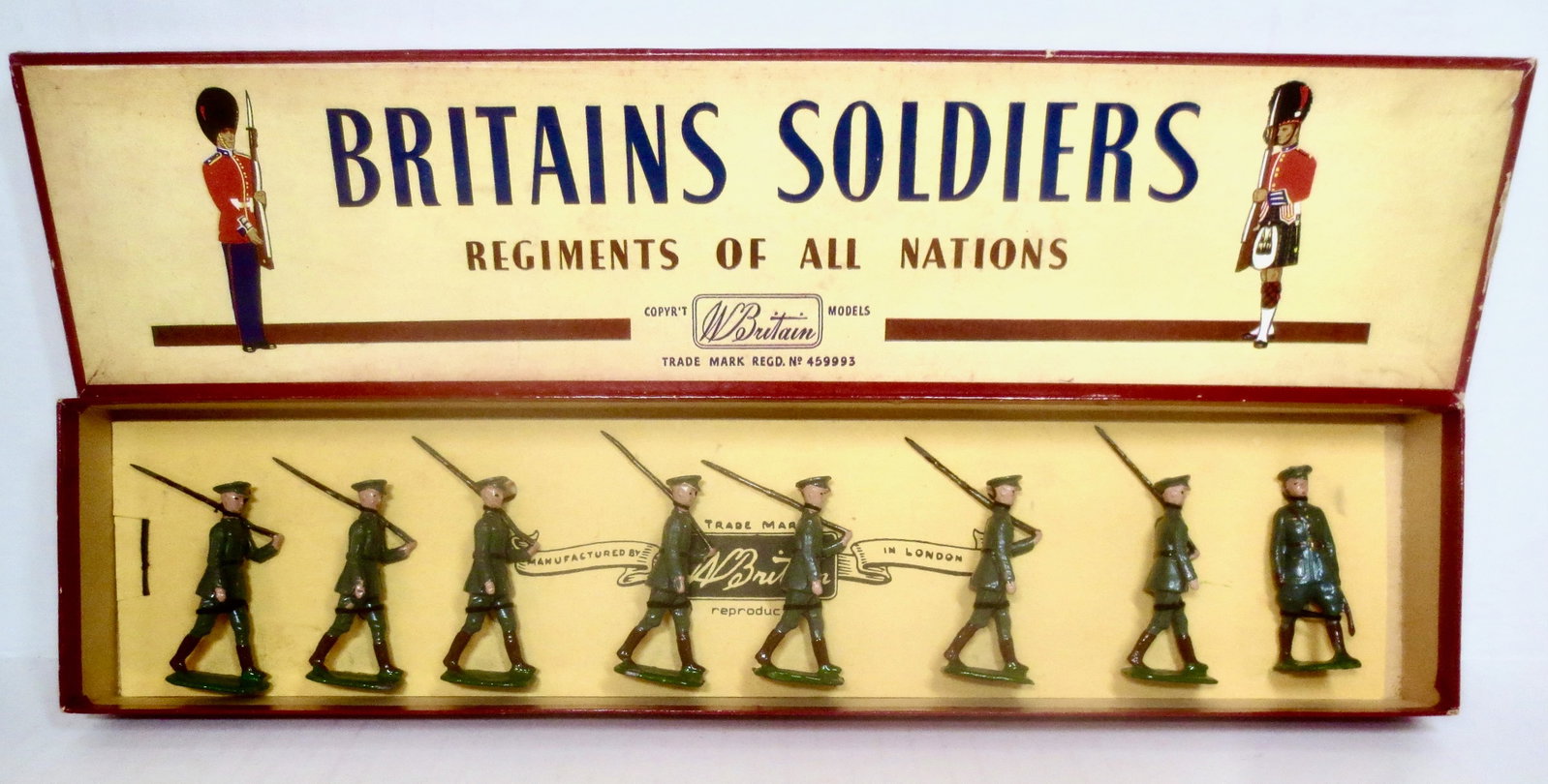 Britains #1603 Republic Of Ireland Infantry: Pre war figures with a post war box. 8 pieces. Near mint condition, retied to card in box. Box very good.