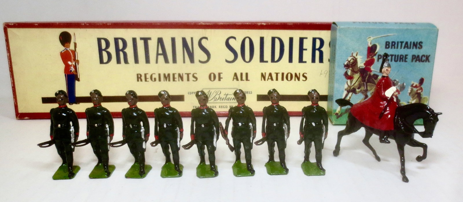 Britains #197 King George V's Own Gurkha Rifles: And, Picture Pack #1334B Farrier Life Guards. 9 pieces. Mint to near mint condition. Boxes excellent.