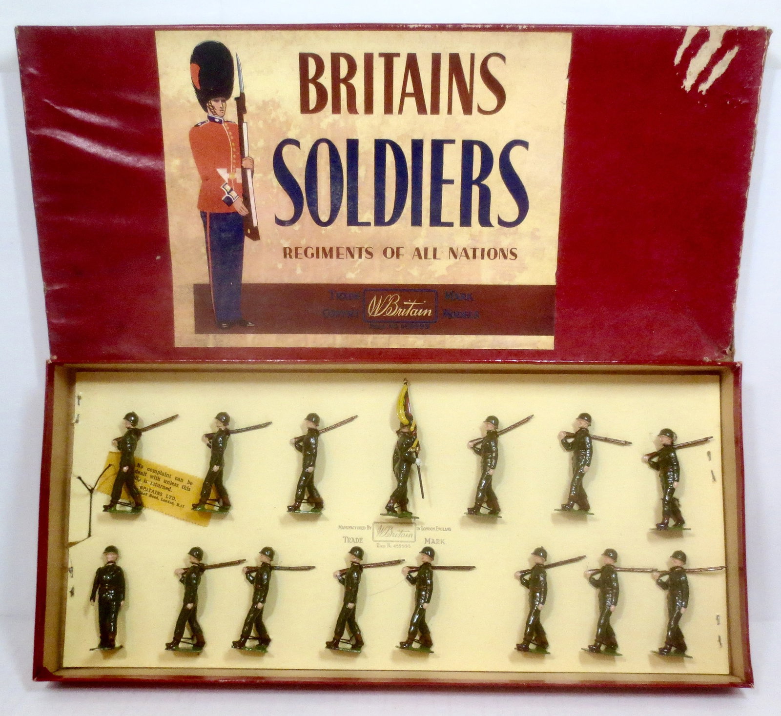 Britains #2105 Venezuelan Infantry Display: Post War. 15 pieces. Mint to near mint condition, tied to card in ROAN label box. Box bottom very good, top in fair condition (bubbling).