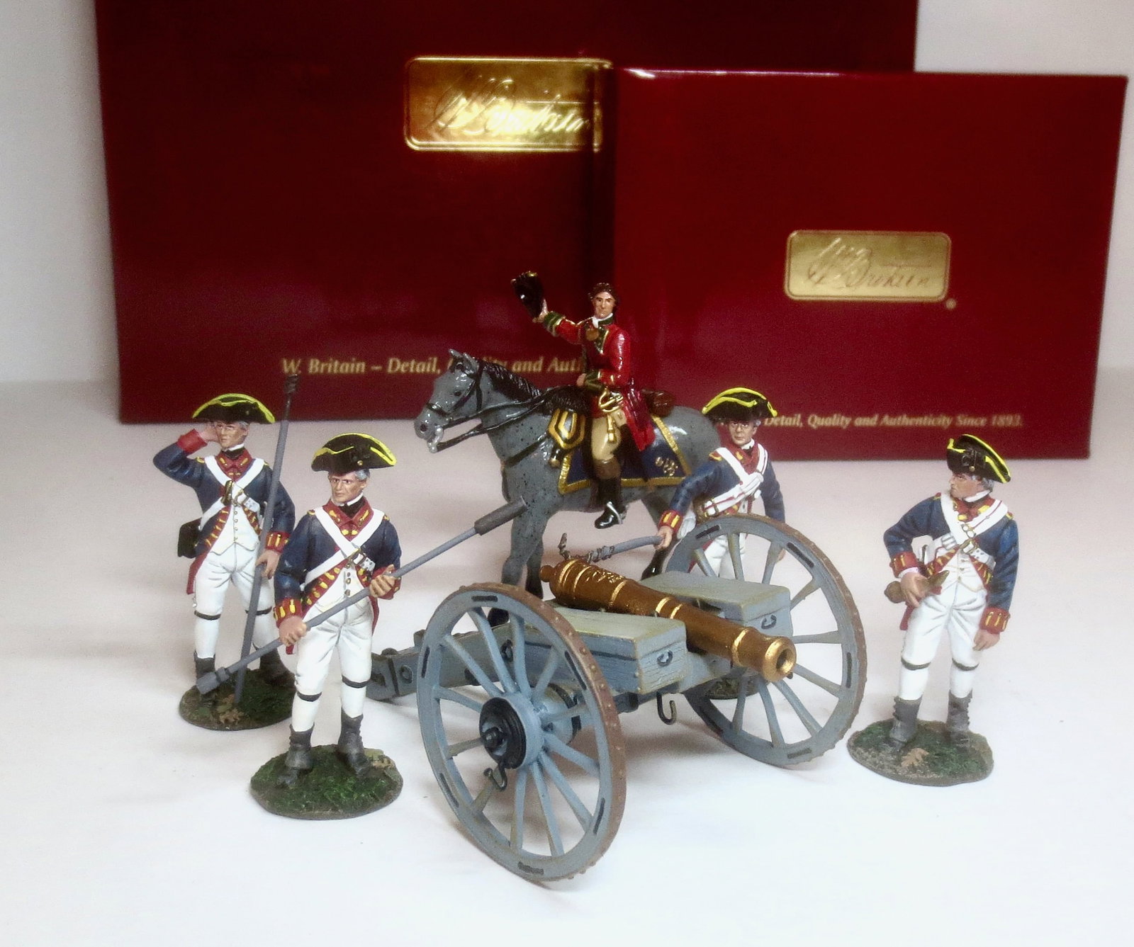 Britains #50010C 45th Regiment Officer: And, #16015 British Royal Artillery 6 Pound Gun & Crew. 6 pieces. Mint condition. Boxes excellent.