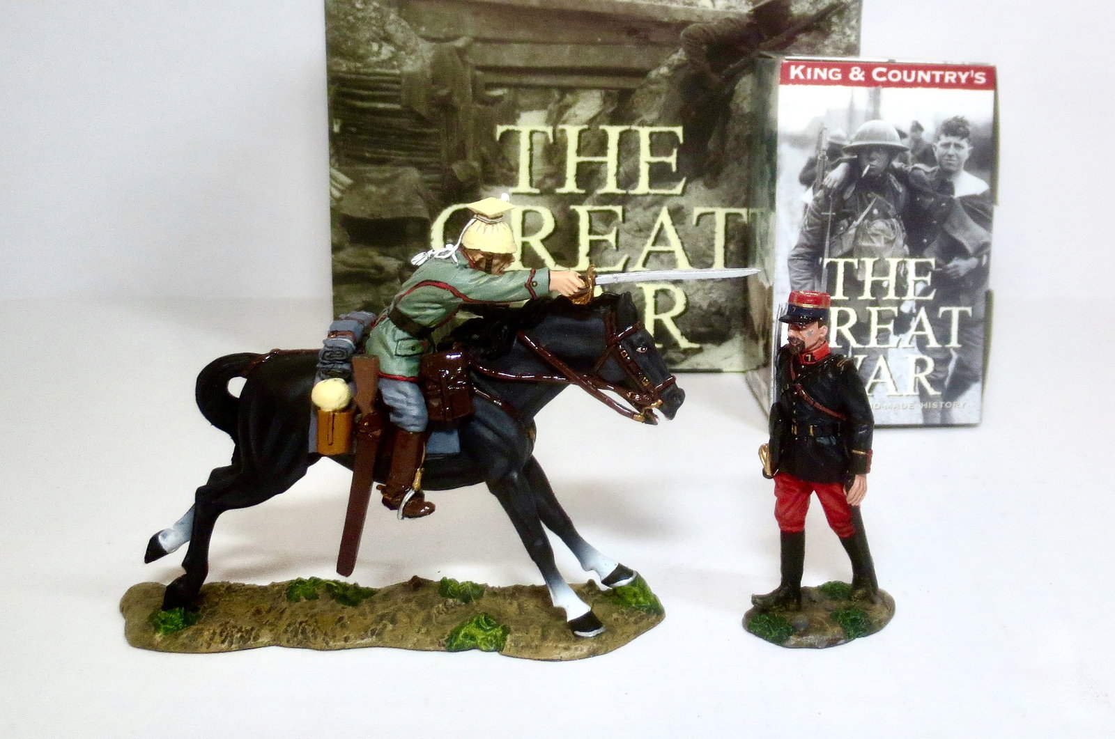 King & Country "The Great War" Series: #FW035 Uhlan Cavalry Officer Charging, and #FW035 French Officer. 2 pieces. Mint to near mint condition. Unboxed.