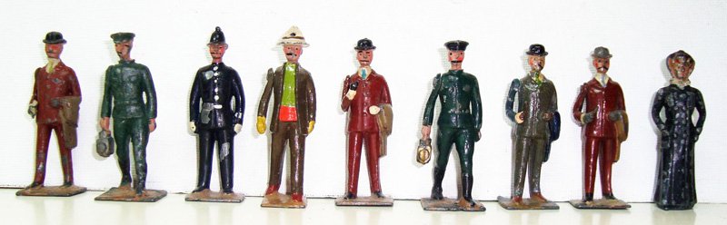 Britains From Set # 168 RARE Civilians: Three men with pipes, Two Chauffeurs. Man in Panama Hat, Policeman, Man with Newspaper and Woman in Long Dress Pre War 9 Pieces Unboxed.