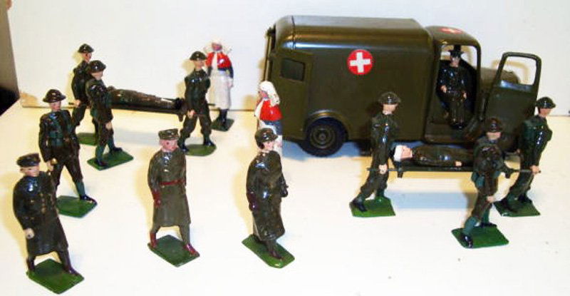 Britains RARE Set # 1897 R A M C Ambulance and Me: set with RARE Female Ambulance Driver, Doctors, Nurses, Stretcher Bearers, Wounded and Orderlies with Ambulance. Pre War 17 Pieces. Unboxed.