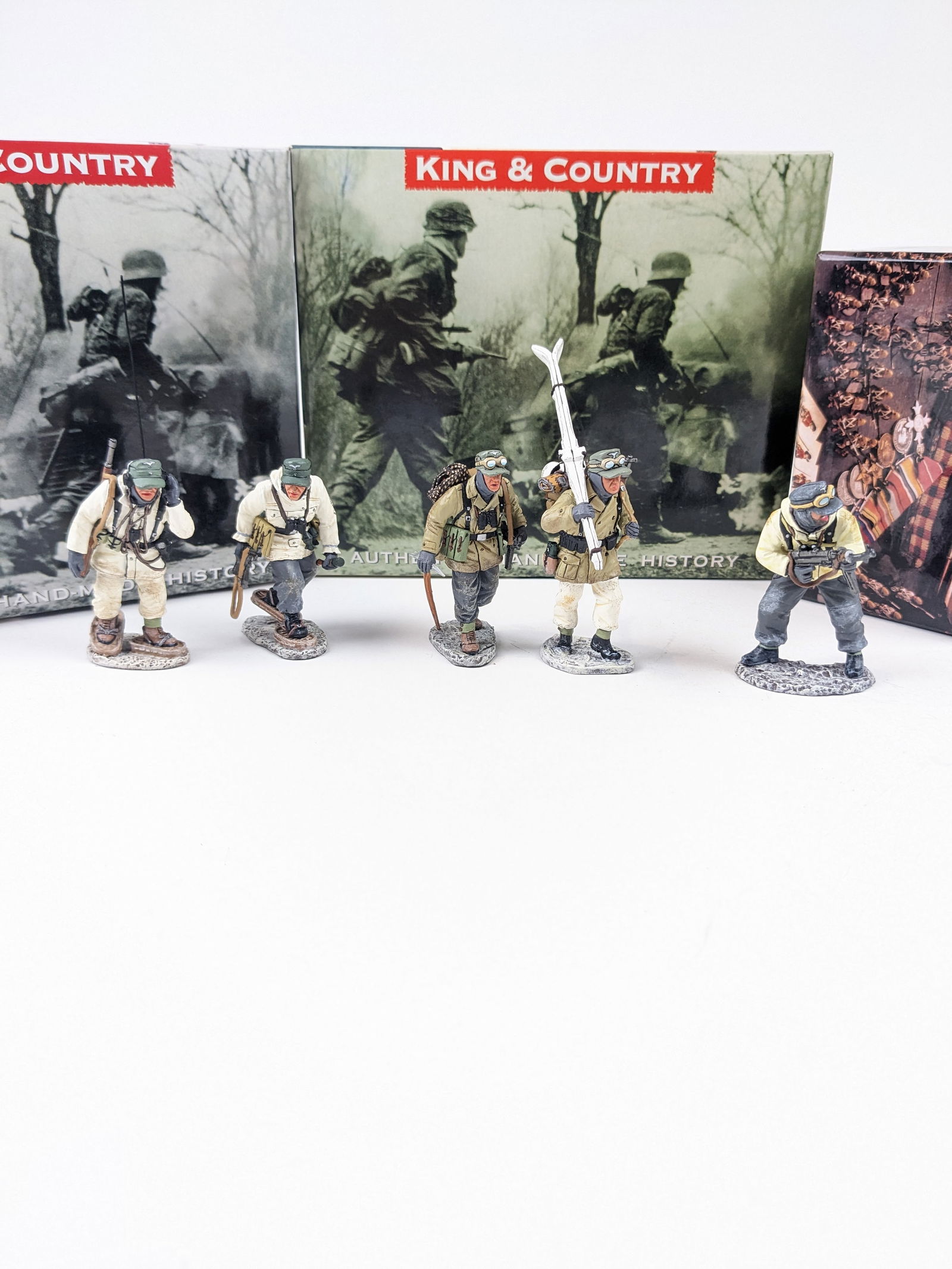 King&Country BBG 12,13,77 Radio, Mountain Troop,: and Officer. 5 Pieces. Condition Excellent, 1 gun tip repaired. Boxes Very Good.