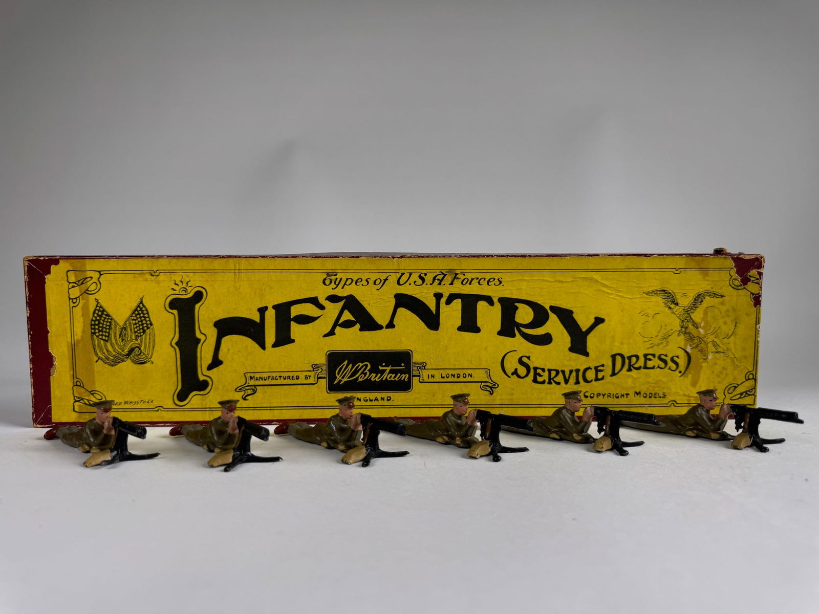Britains No 359 U.S. Machine Gunners: Pre war. Rare. Flat caps, khaki uniforms, firing prone. Original Whisstock box. 6 pieces. Condition excellent. Box very good with corrugated backing; but no slot.