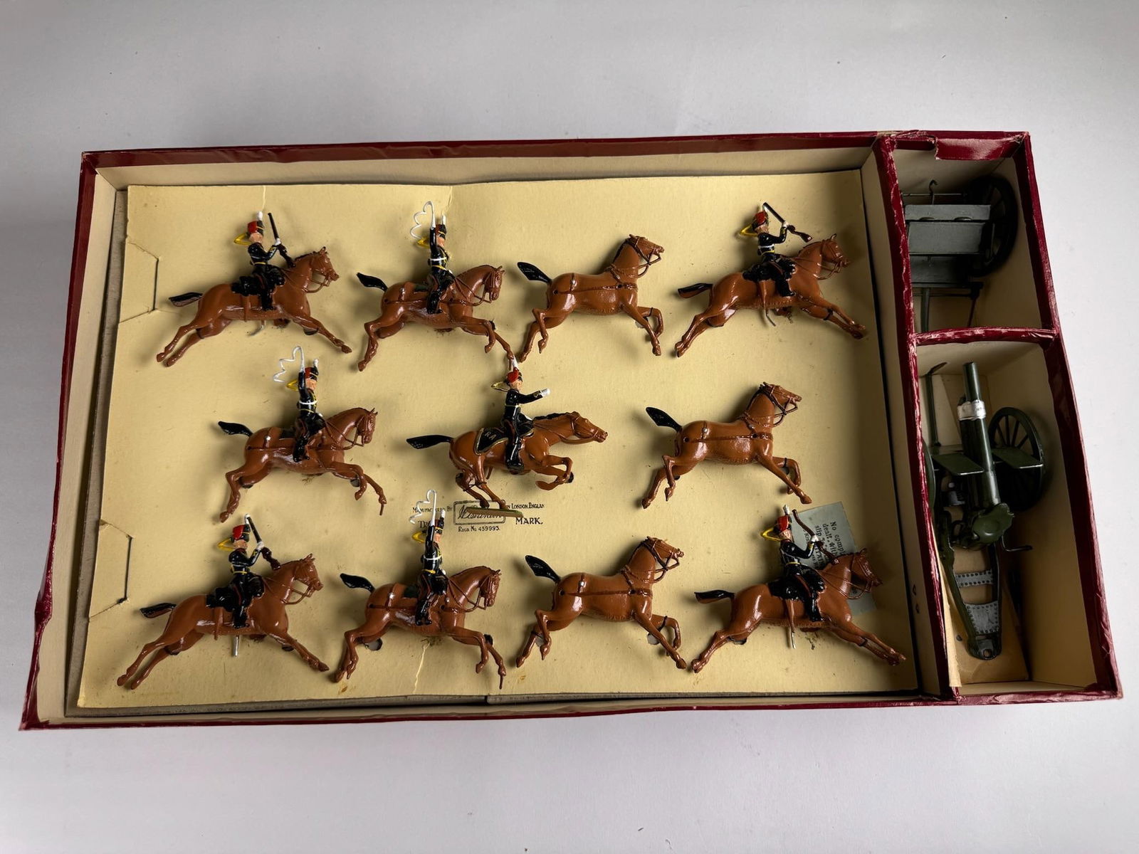Britains No 9419 Royal Horse Artillery: Gun and Team. Post war. 13 pieces. Condition excellent. Box good with fading, water marks and two corners torn. Figures tied to original tie card.