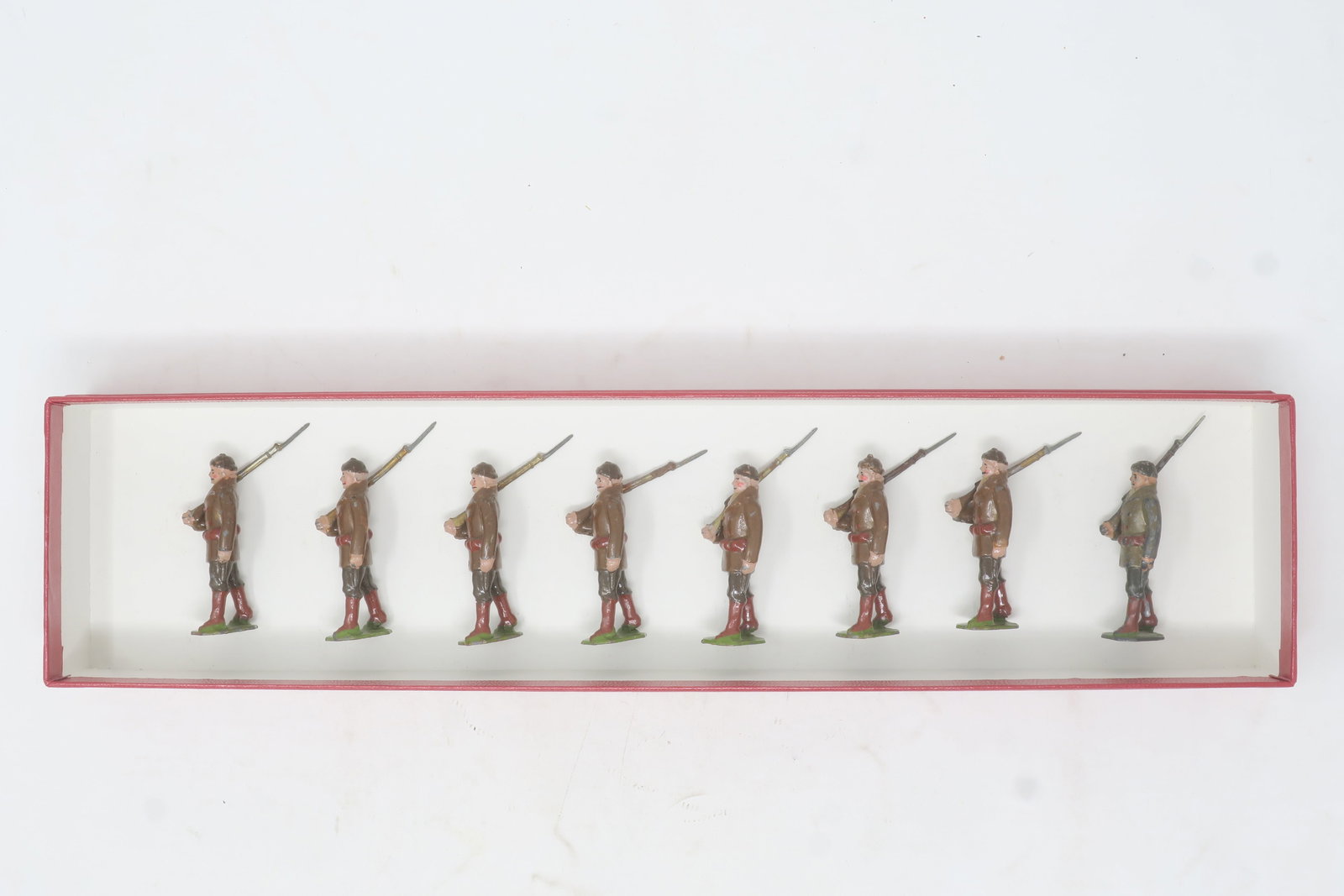 Britains set #214 Royal Canadian: Mounted Police in Winter Dress, 8 pieces; Very good-one piece casting fault to rifle, one mismatched