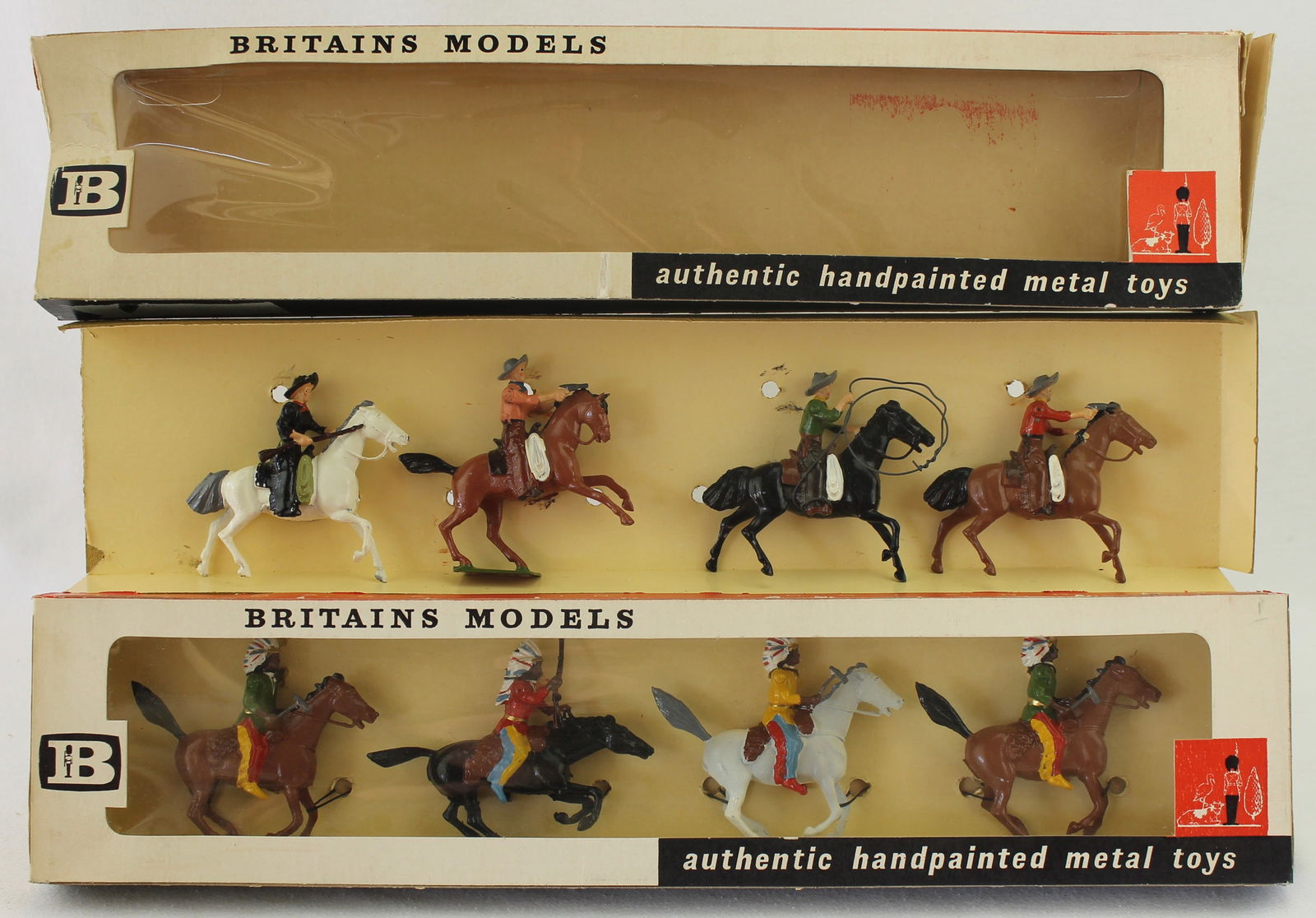 Britains Lot Cowboys and Indians: Lot includes Set 9288 Mounted Cowboys untied in Cello Front Display Box and Set 9289 Mounted Indians Tied in Sealed Cello Front Display Box. 8 Pieces. Condition Mint. Boxes Fair to Excellent. Cowboys