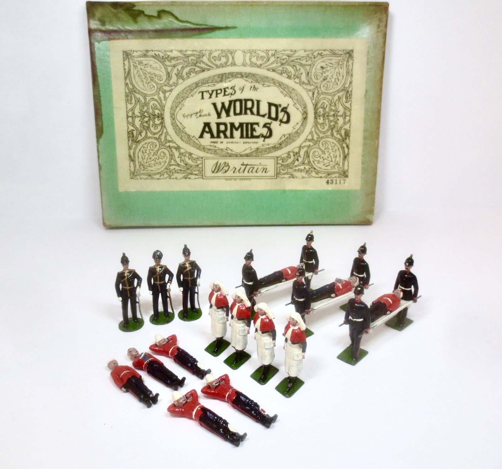 Britains #137 Army Medical Service: With Nursing Sisters & Wounded. Pre war issue. 24 pieces. Excellent to good condition. Some retouching. Box fair, with stained top & corner splits.