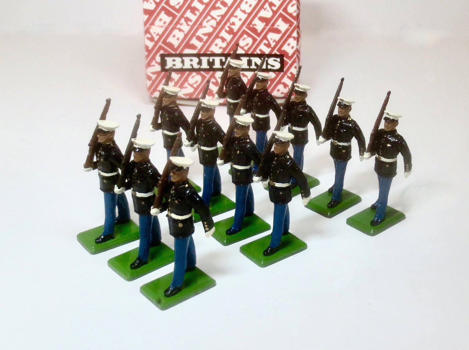 Britains Metal Models USMC Trade Box: 12 pieces. Mint to near mint condition. Box very good.