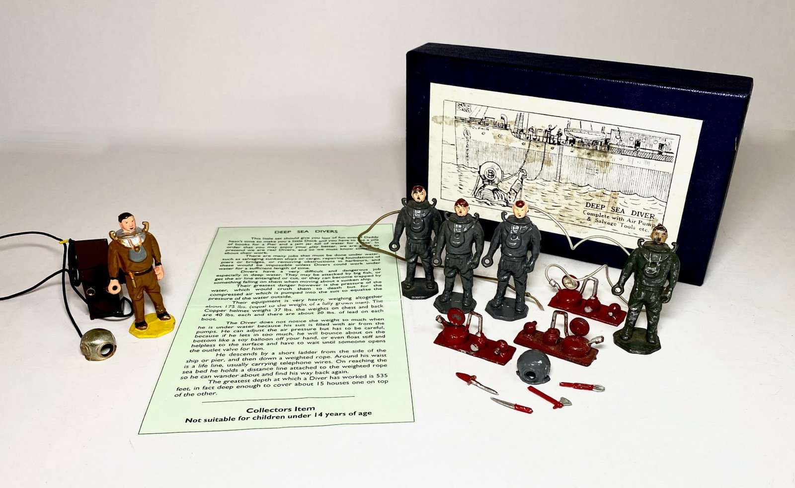 Crescent Deep Sea Divers: 14 pieces. One recast in near mint condition, plus 4 originals with accessories. Excellent to good condition (missing two helmets). Box very good.