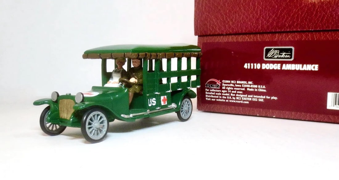 Britains #41110 Dodge Ambulance: With driver and nurse passenger. 5.5" long. Comes with separate windshield. Mint condition. Box excellent.