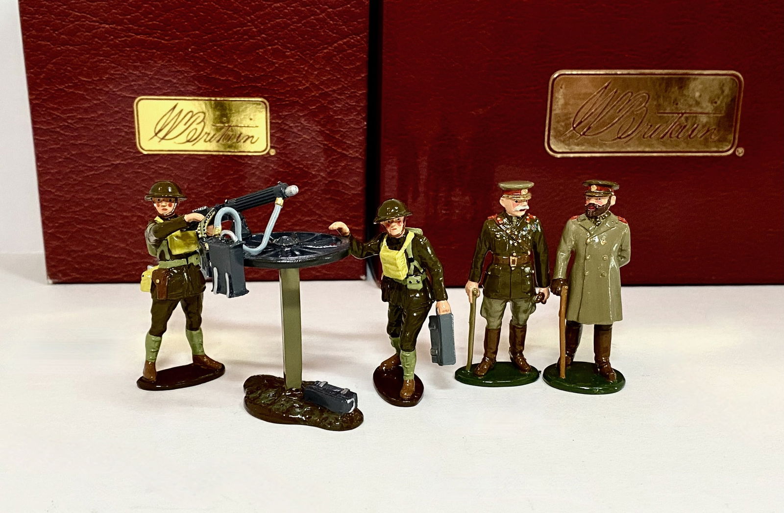 Britains World War Sets: #41026 Vickers Maxim Machine Gun with U.S. Detachment, and #41149 King George V and Earl Kitchener in France. 5 pieces. Mint condition. Boxes excellent.