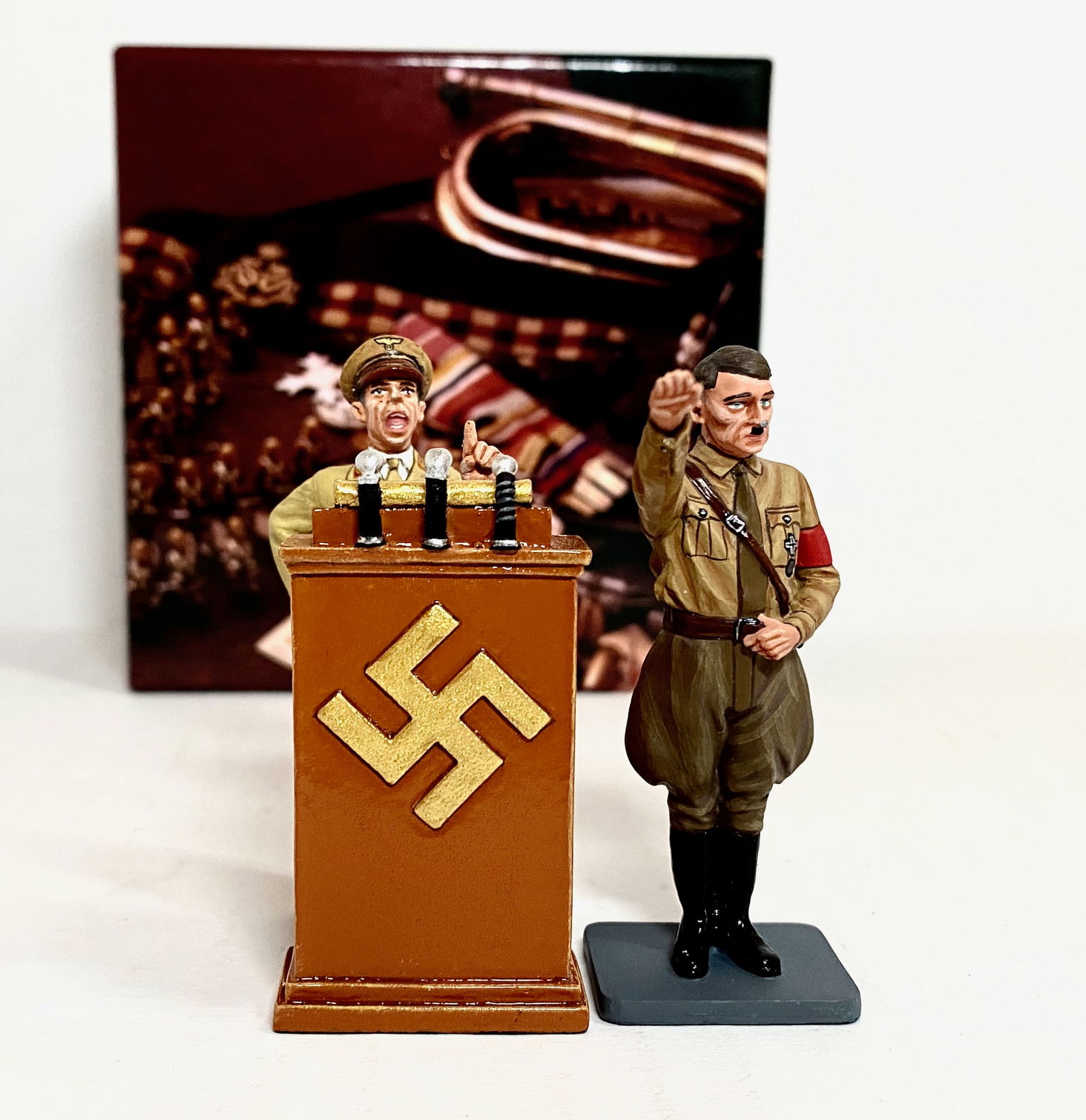 King & Country WW2 Personality Figures: #LAH202 Propaganda Minister Josef Goebbels. And, #LAH044 The Fuhrer, Adolf Hitler. Dressed in a simple brown-shirt uniform, Hitler stands giving his famous, almost horizontal, salute. 2 pieces. Mint c