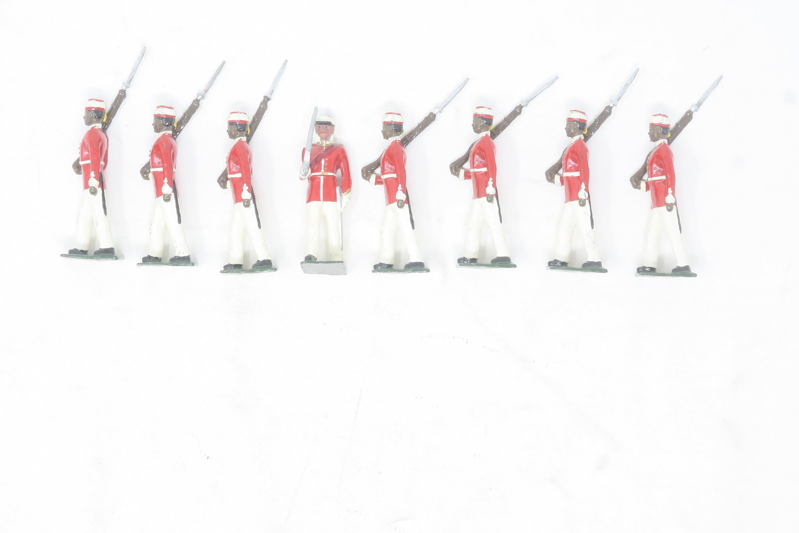 Nostalgia Jamaica Militia Volunteers: red coats, white trousers and pill box caps at the slope, 8 figures including officer; Excellent