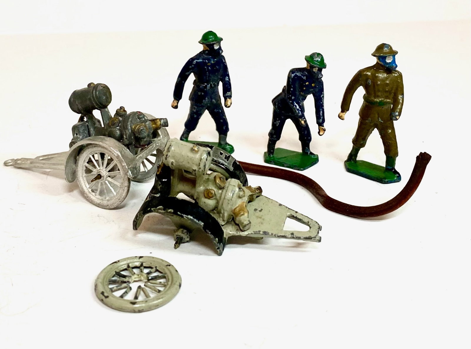 Taylor Barrett Civilian Fire Brigade: 5 pieces. One missing hand, one water pump cart recast and one with broken wheel. Unboxed.