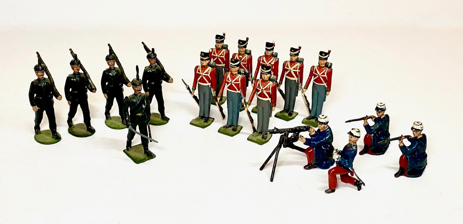 Britains Pre and Post War Assortment: Pre war Rifle Brigade from Set #9, Fort Henry Guards from set #9155, and assorted French Foreign Legion figures. 18 pieces.