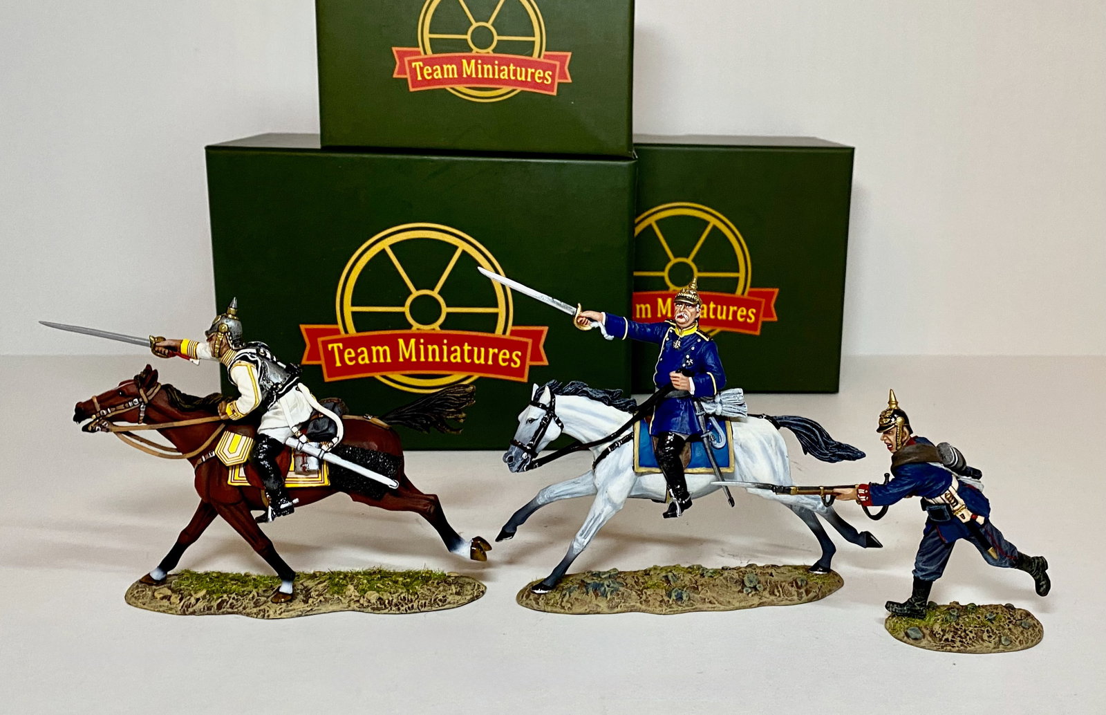 Team Miniatures Franco Prussian War Figures: 3 pieces. Including Count Von Bismarck mounted and leading a charge. Mint condition. Boxes excellent.