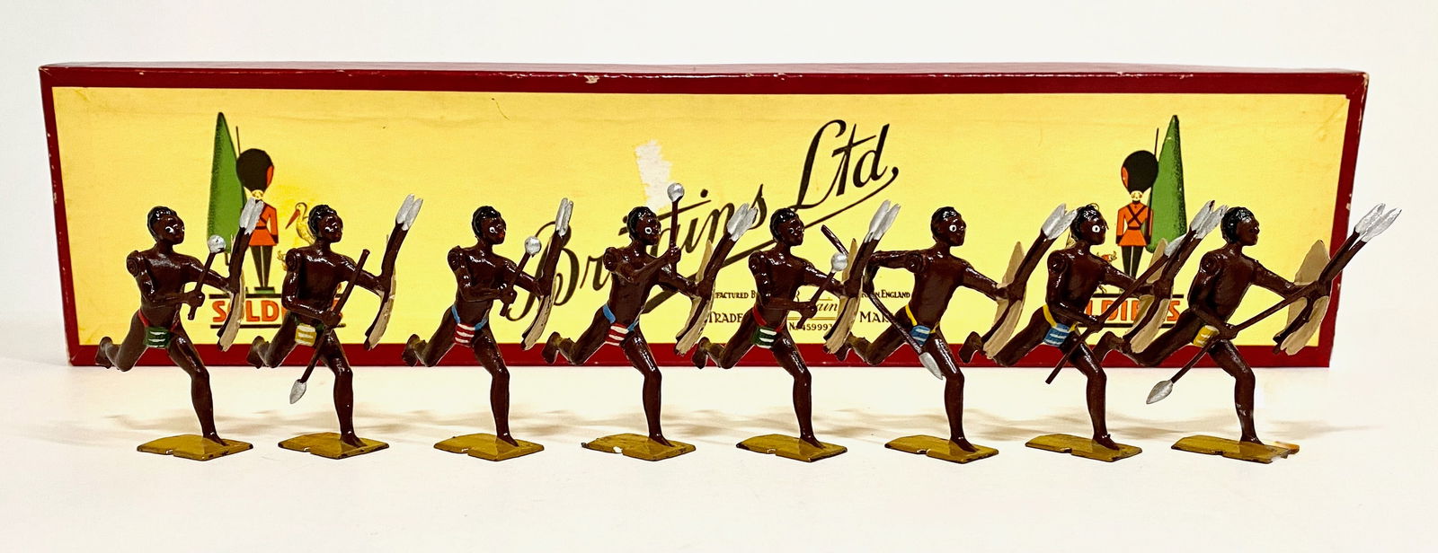Britains #147 Zulus African Warriors: Zulus charging with knobkerrys, spears and shields. Post war circa 1946-1959. 8 Pieces. Mint to near mint condition. Comic label box in excellent condition.