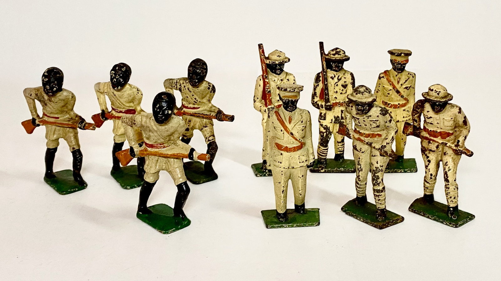 Grey Iron Figures: Ethiopian Tribesmen, Infantry and Officer. 10 pieces. Good to fair condition. No boxes.