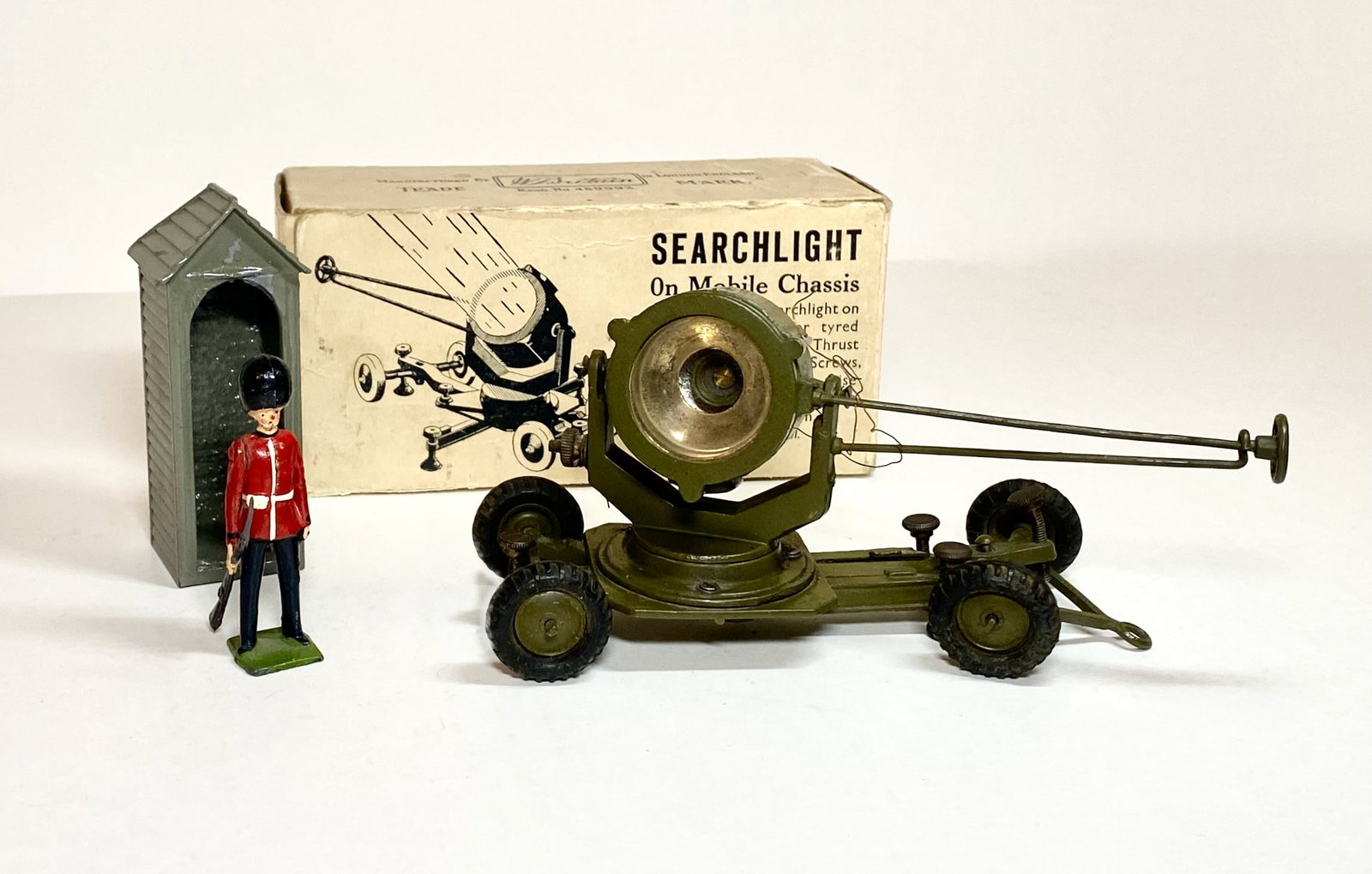 Britains #1718 Searchlight on Mobile Chassis: Plus Scots Guards Sentry. Good condition. Searchlight box very good.