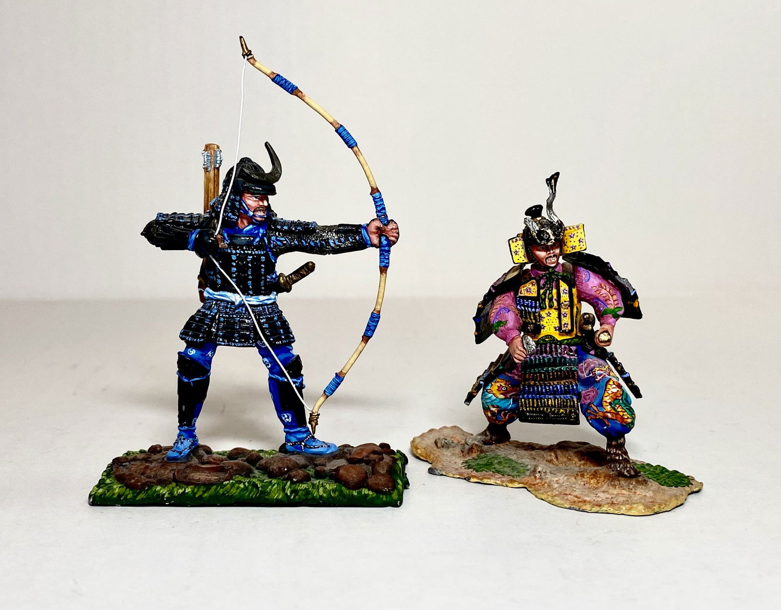 Niena Russia, Samurai Warrior: 2 pieces. Fair condition, missing swords and arrow, and part of helmet. Unboxed.