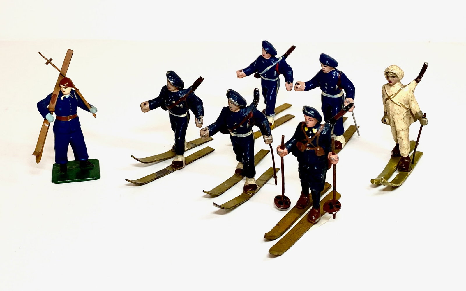 Quiralu Aluminum Ski Patrol Figures: Plus one Japanese. 7 pieces. Many missing poles, otherwise excellent condition. Unboxed.