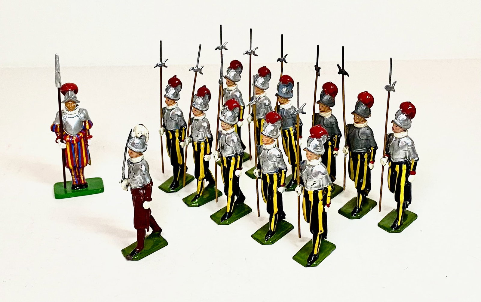 Britains Swiss Papel Guards: 13 pieces. Three mismatched and one modern, the rest in near mint condition. Unboxed.