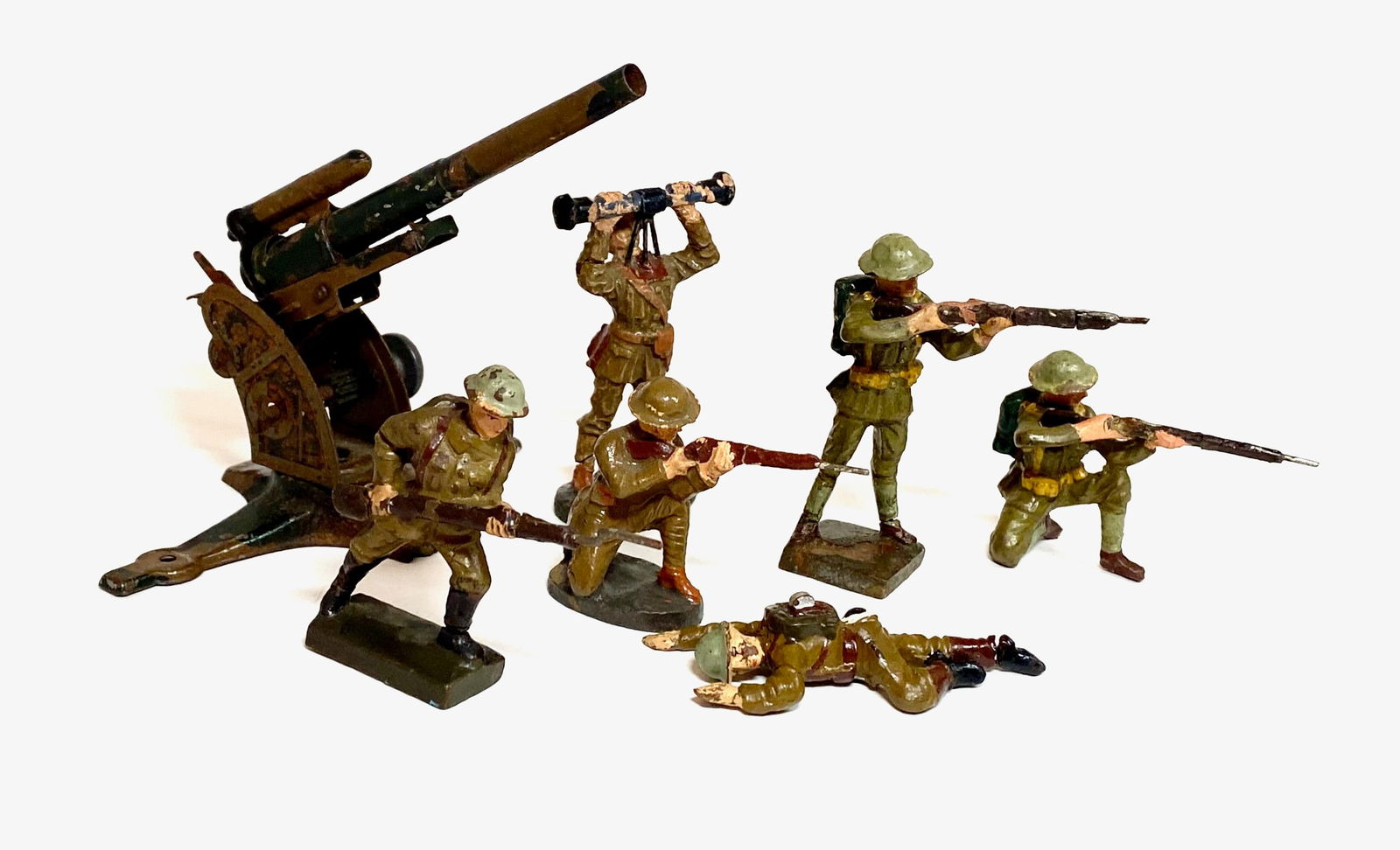 Assorted Composition Figures With A.A. Gun: 7 pieces. Good condition. Unboxed.