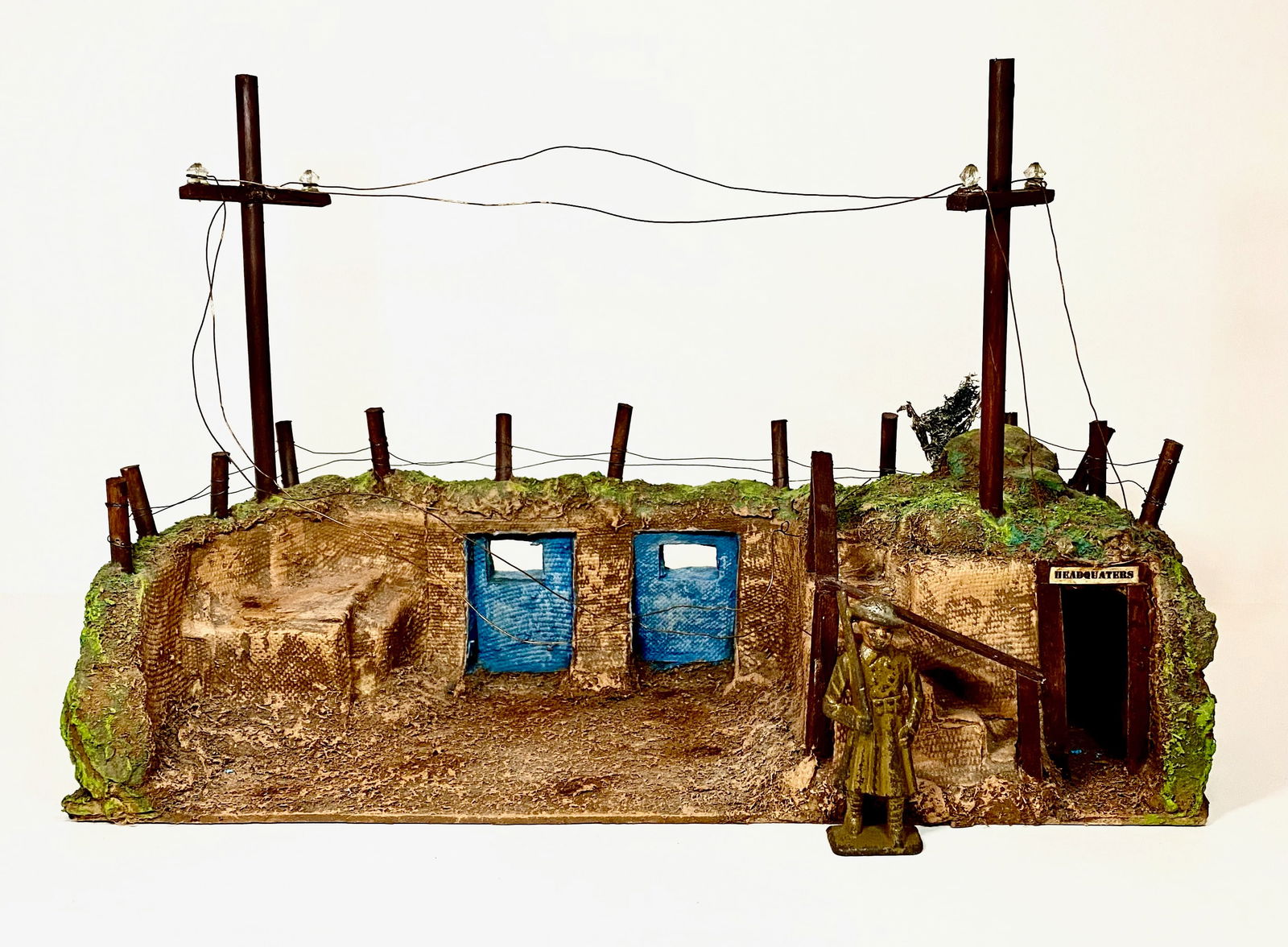 Composition & Wood Trench Headquarters: Measures 13.5" long, 10" tall, 5.5" deep. Soldier shown for scale, not included. Excellent condition, some paint loss and chipping. Unboxed. Extra shipping charges due to large lot size.