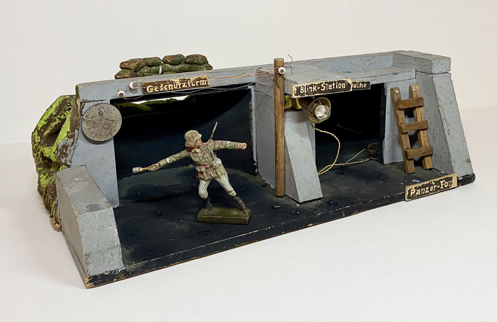 Composition & Wood German Trench Section: Measures 12.5" long, 4" tall, 8" deep. Soldier shown for scale, not included. Excellent condition, some paint loss and chipping, and loose pieces. Unboxed. Extra shipping charges due to large lot size