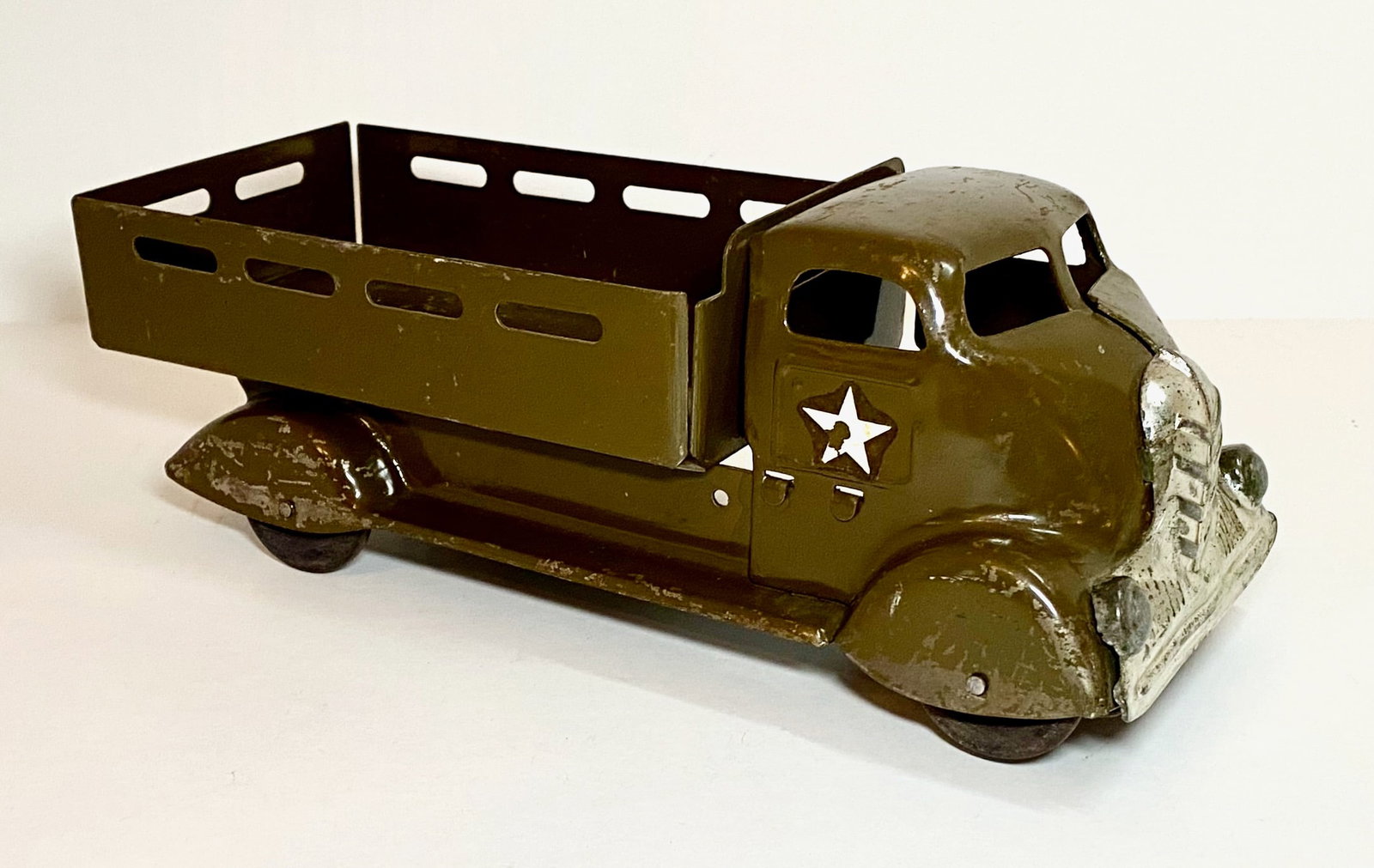 Marx Pressed Steel Army Truck: 12" long. Very good condition, with some paint loss. Unboxed.