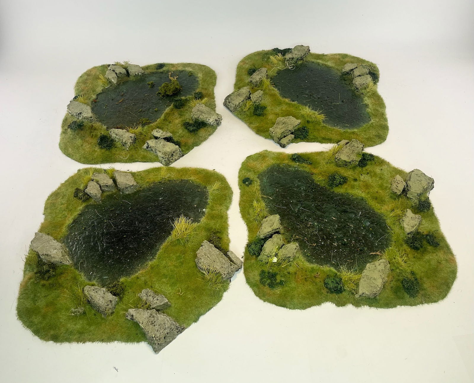 Pond Diorama Baseplates: Unknown Maker. 4 Roughly 14x14 inch plates. Condition Very Good. No Box.