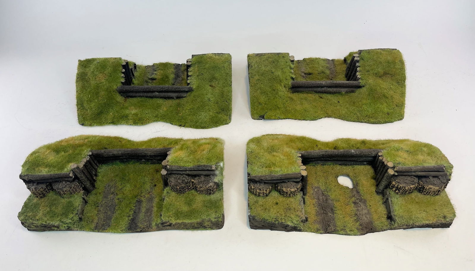 Log Trench Hillside Diorama Assortment: Approximately 10x6x2.5 inches. 4 Pieces. Condition Very Good. No Box.