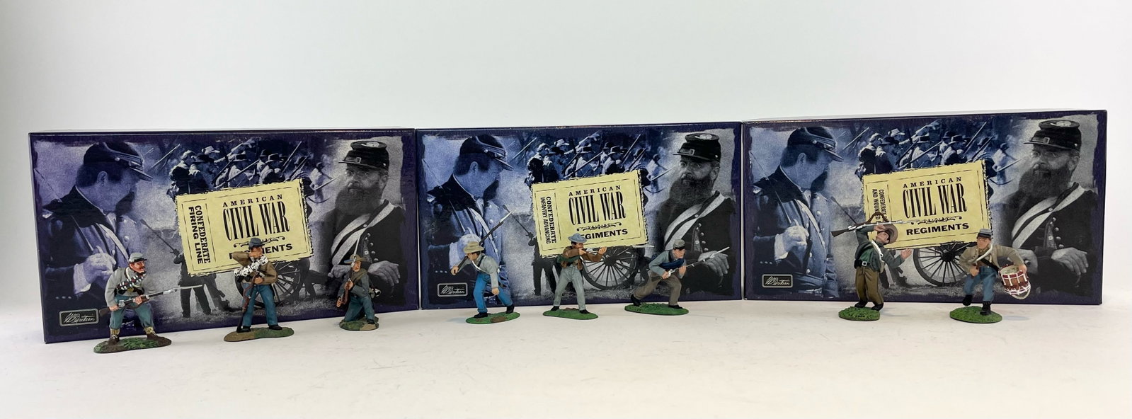 Britains Confederate Set Assortment: Includes Set 17102 Confederate Firing Line 3 Pieces, Set 17014 Confederate Infantry Advancing 3 Pieces, and Set 17109 Confederate Drummer and Wounded Private. 8 Pieces Total. Condition Excellent. Boxe
