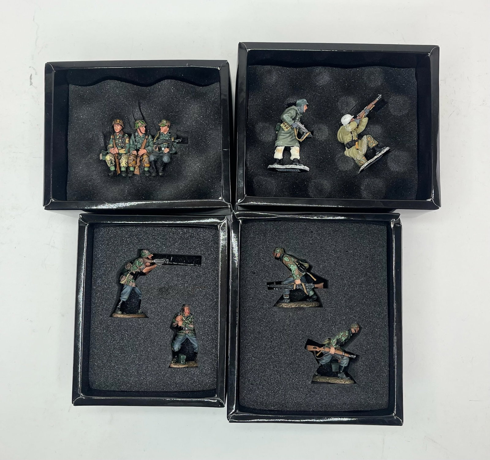 King & Country Waffen SS Set Assortment: Includes Sets WS053 Sitting Sergeant & 2 Riflemen, 1 Piece, WS085 Prepare to Fire, 2 Pieces, WS113 MG34 Gun Team, 2 Pieces, and WS123 Machine Gun Team Forward, 2 Pieces. 7 Pieces Total. Condition Exce