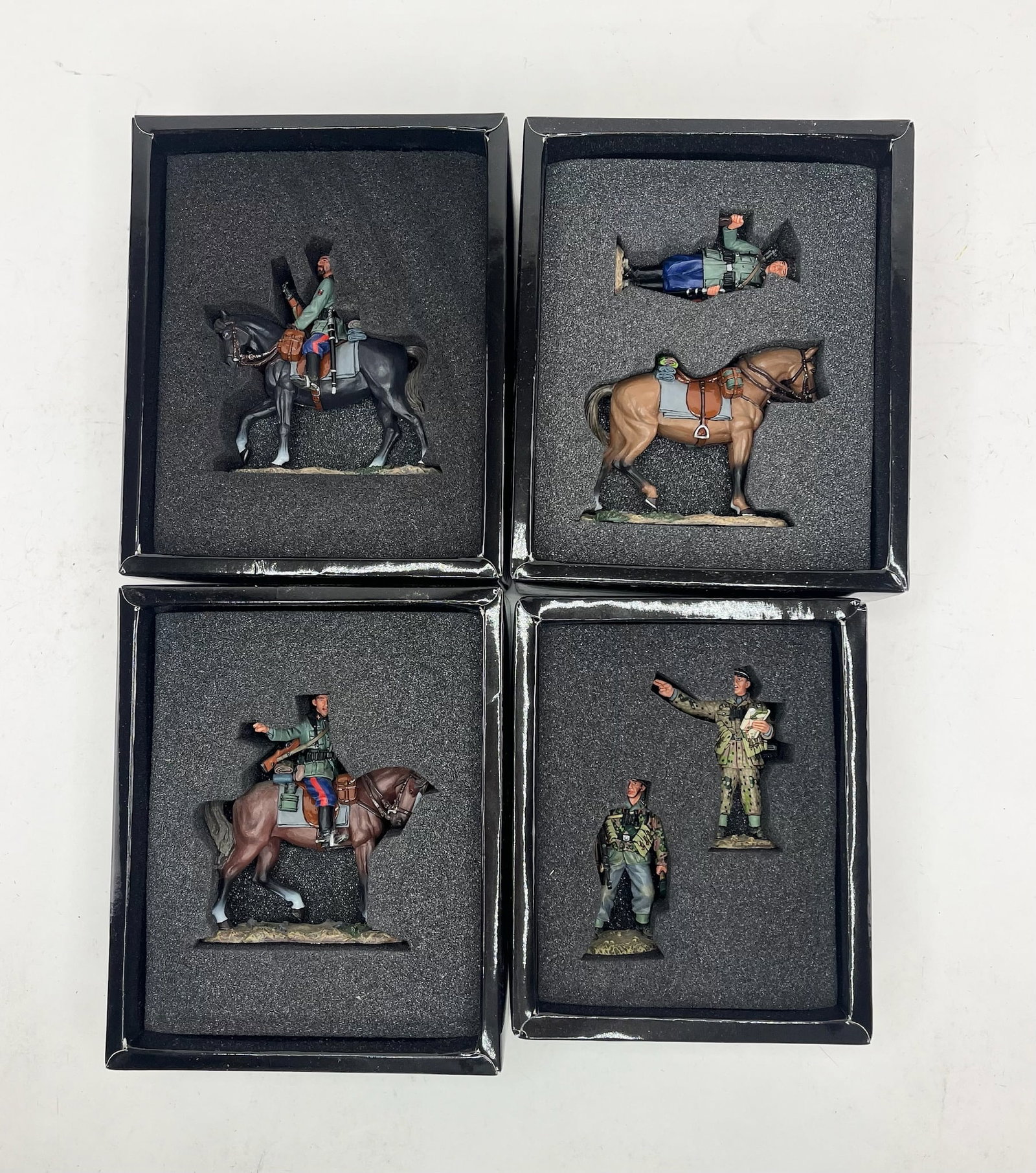 King & Country Waffen SS Set Assortment: Includes Sets WS146 Mounted Cossack Holding Rifle Looking Left, 1 Piece, WS147 Standing Cossack and Horse, 2 Pieces, WS148 Mounted Cossack Pointing, 1 Piece, and WS173 Panzermeyer Set, 2 Pieces. 6 Pie