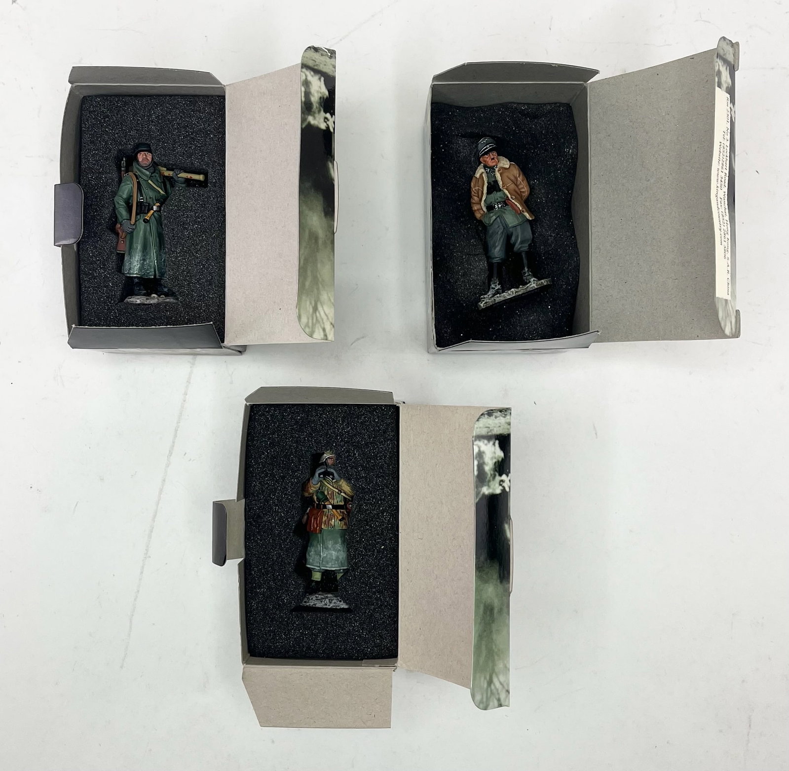 King & Country Battle of the Bulge Assortment: Includes BBG007 Sepp Dietrich, BBG026 Winter Rifleman, and BBG036 Gun Commander. 3 Pieces. Condition Excellent. Boxes Excellent.