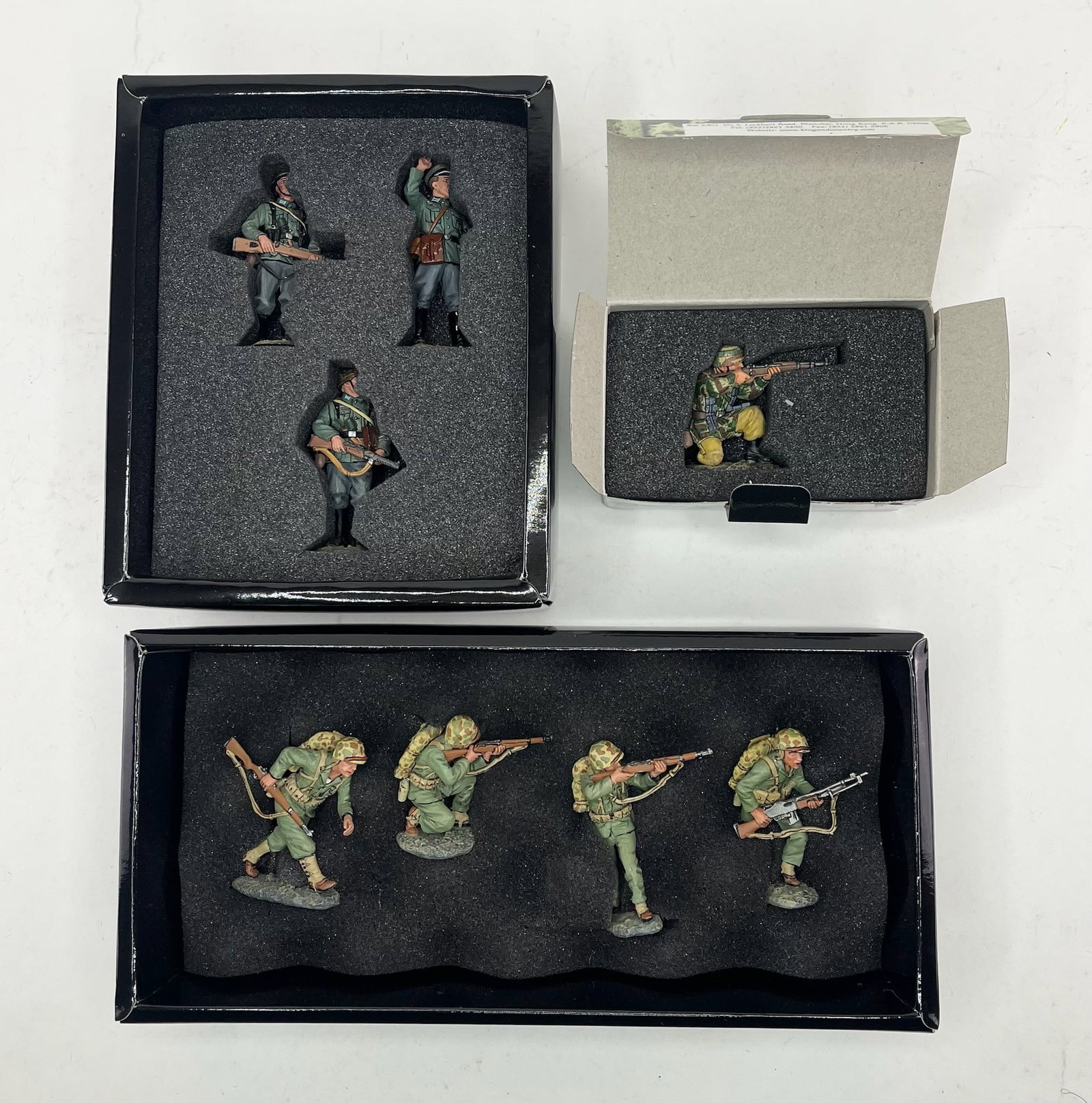 King & Country World War II Set Assortment: Includes Sets IWJ021 Running For Cover, 4 Pieces, FOB044 Polizei in Action, 3 Pieces, and FJ012 German Fallschirmjager Kneeling/Firing Rifle, 1 Piece. 8 Pieces Total. Condition Excellent. Boxes Excell