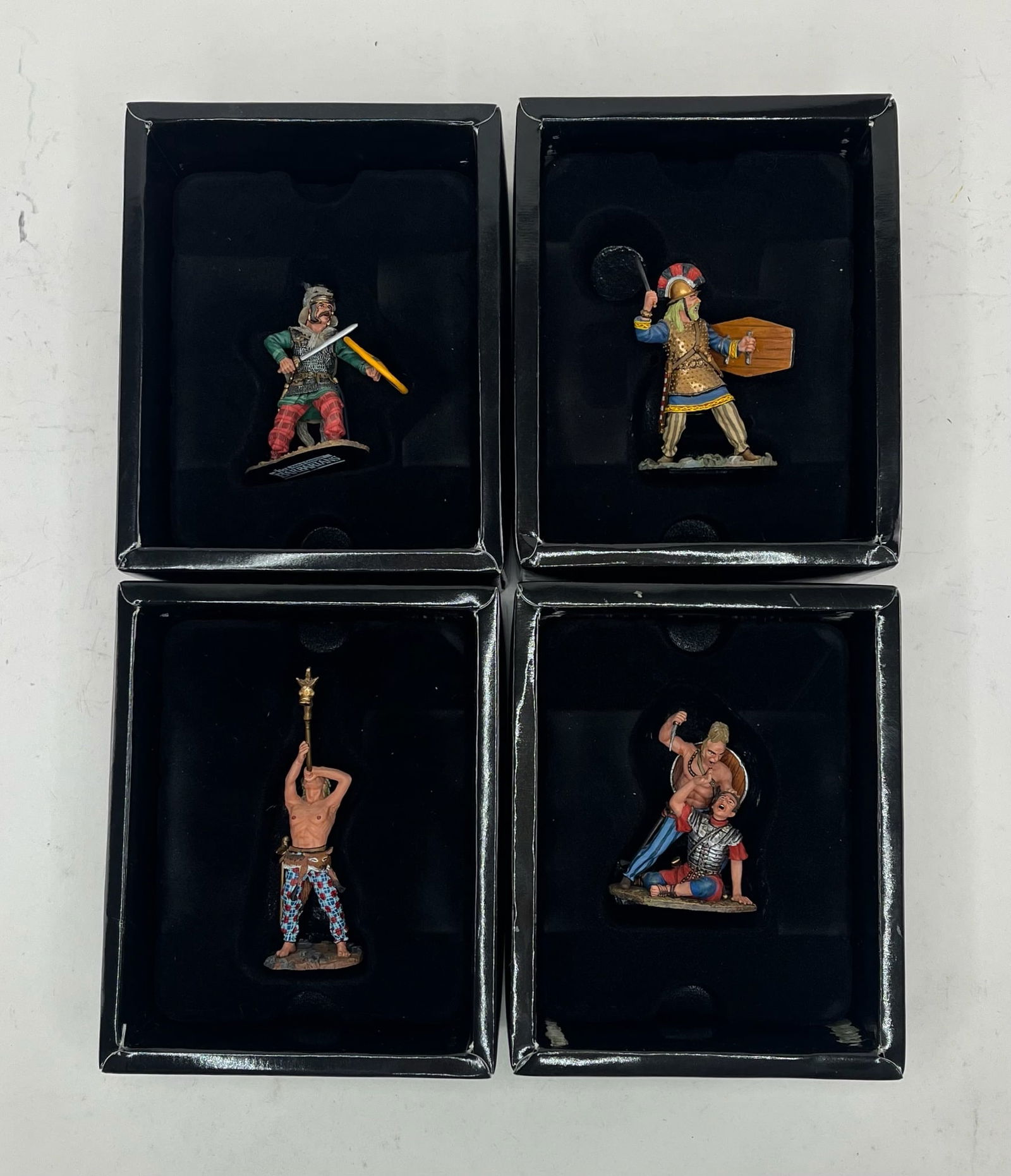 King & Country Roman Legion Barbarians Assortment: Includes BAR009 Stepping Warrior with Sword and Shield, BAR010 Hacking Warrior with Sword and Shield, BAR011 Standing Warrior with Sword and Shield Bare Chest, and BAR012 No Mercy!. 4 Pieces. Conditio
