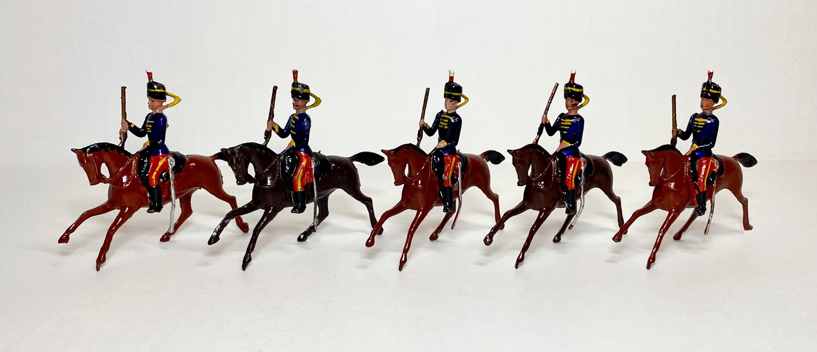Britains From #12, 11th Hussars: Pre war on cantering horses. 5 pieces (one mismatched). Excellent condition. Unboxed.