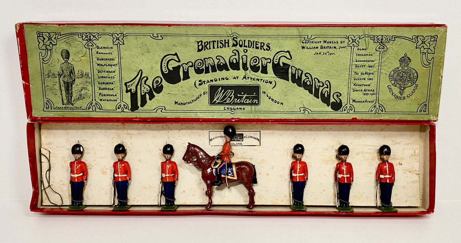 Britains #111 Grenadier Guards: Pre war. 7 pieces. Excellent condition. Whisstock label box in very good condition.