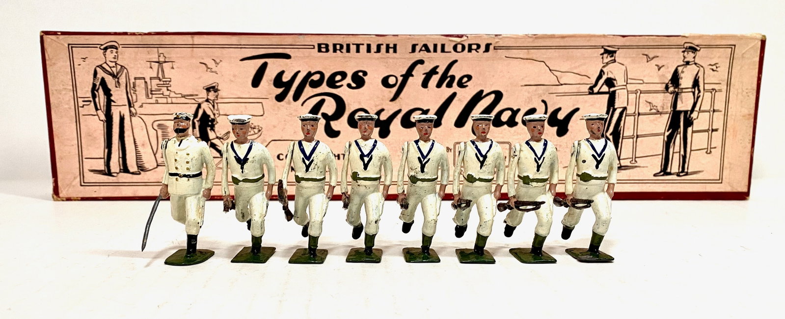 Britains #80 Whitejackets of The Royal Navy: Pre war issue. 8 pieces. Excellent to very good condition. Types of The Royal Navy label box very good.