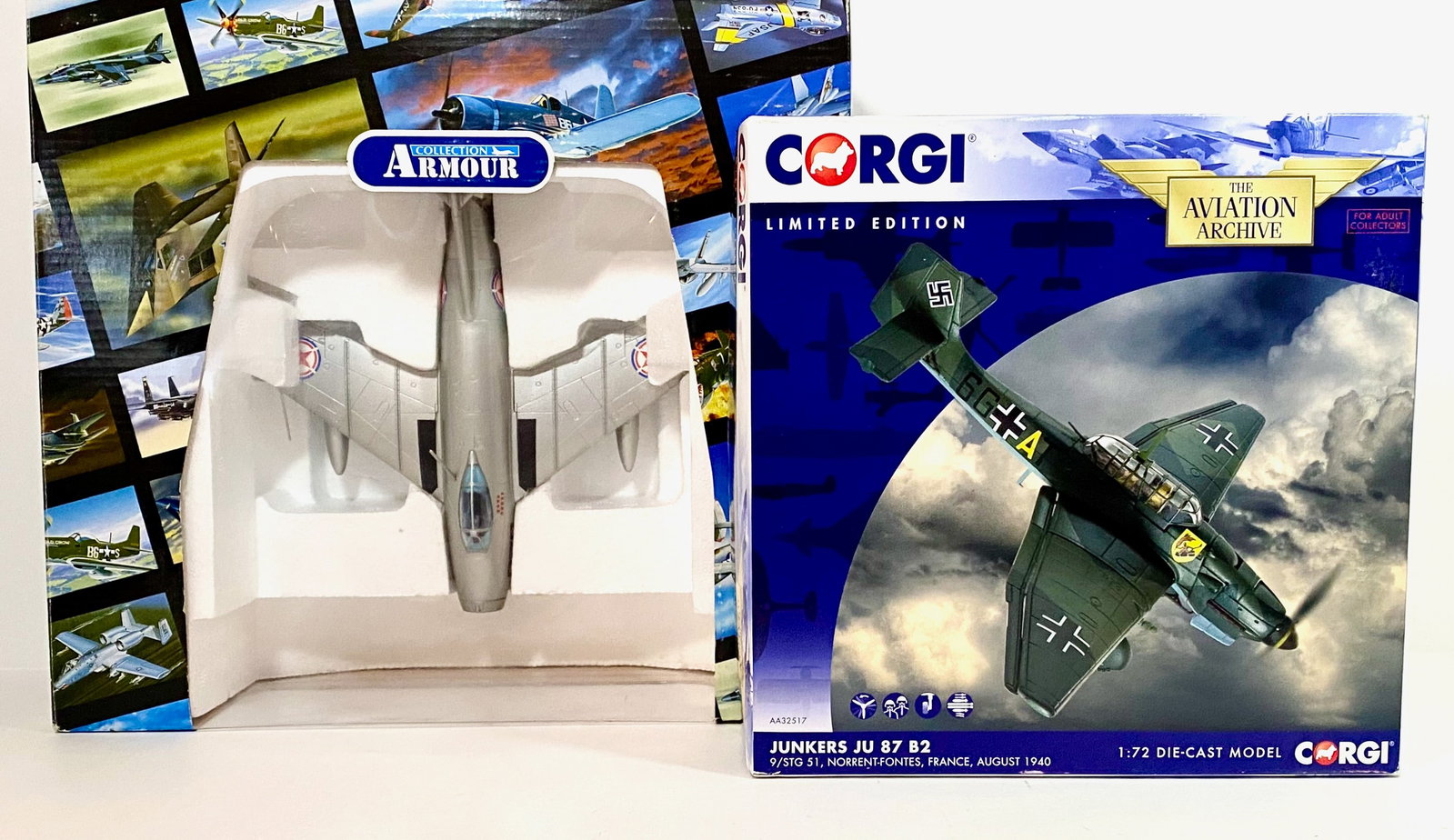 Two War Planes: Franklin Mint Armour Collection MIG 15, and Corgi Junkers JU87 B2. Both in mint condition. Boxes excellent.