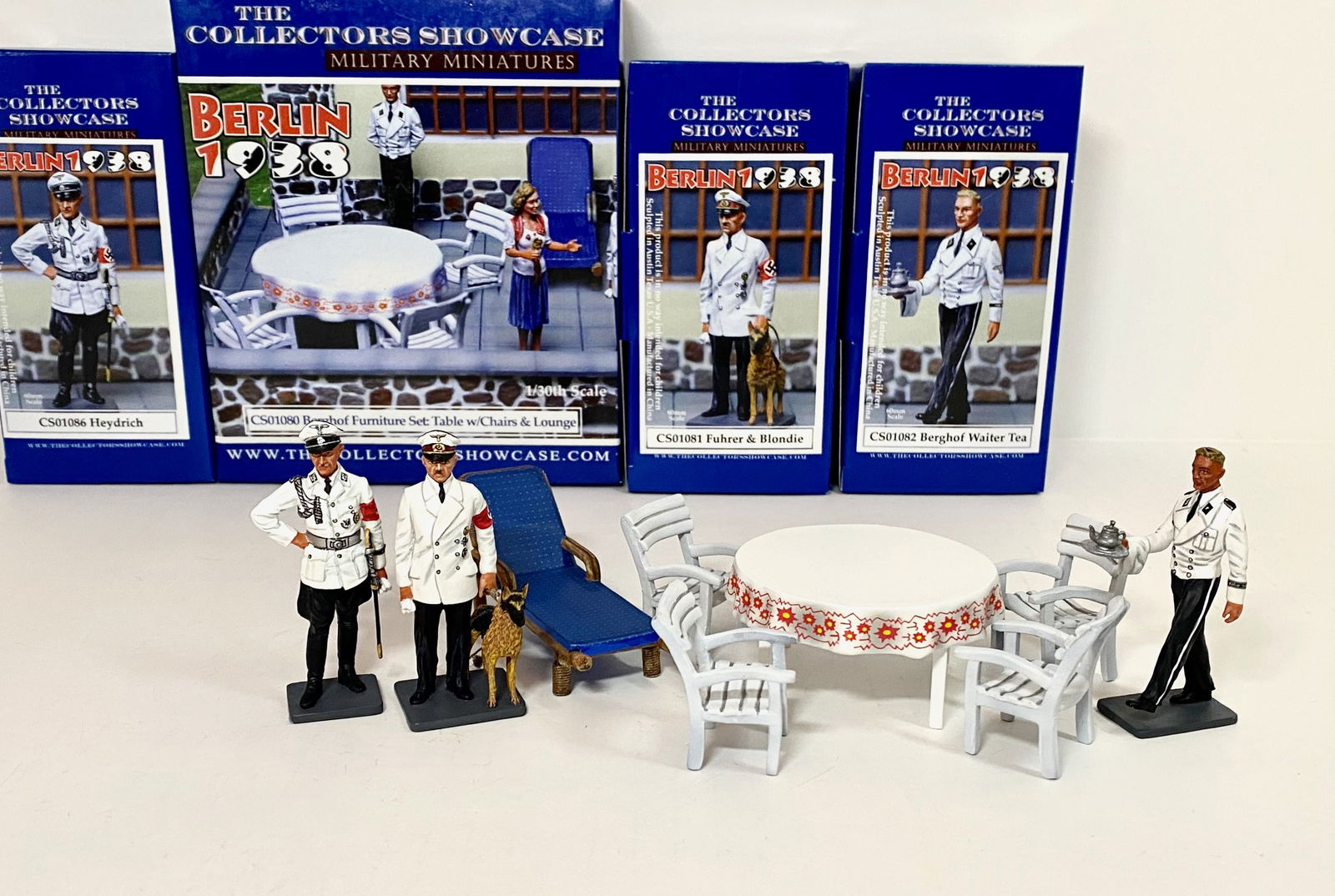 Collectors Showcase Berghoff Series: Including; Berghoff Furniture set, Berghoff Waiter, Heydrich, and The Fuhrer with his dog Blondie. 8 pieces. Mint condition. Boxes excellent.