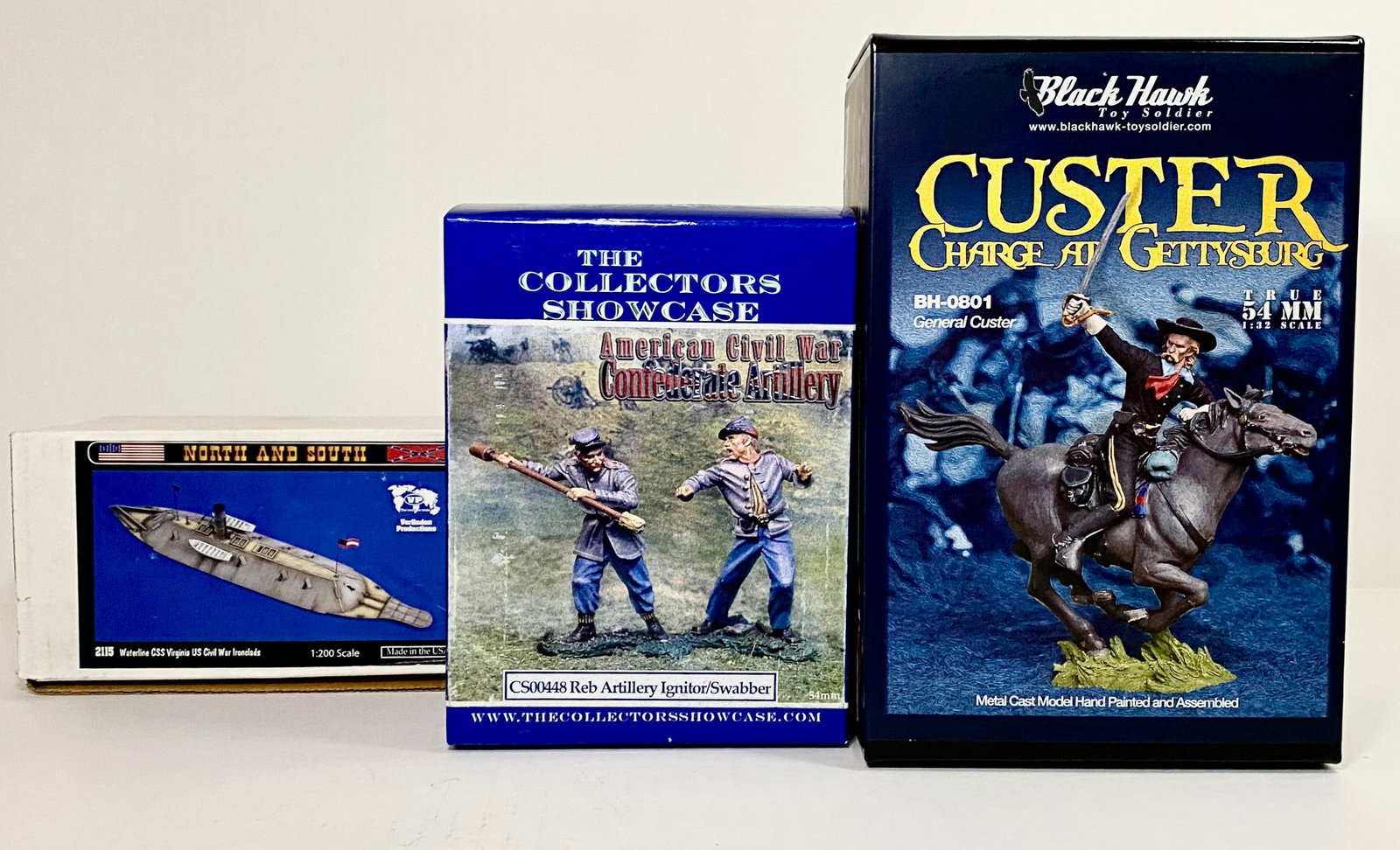 American Civil War Assortment: VP 14" CSS Virginia Ironclad war ship (plastic, build and paint your own model). Plus Collectors Showcase Rebel Artillery Figures, and Black Hawk, Custer's Charge at Gettysburg. All mint in box. Boxes