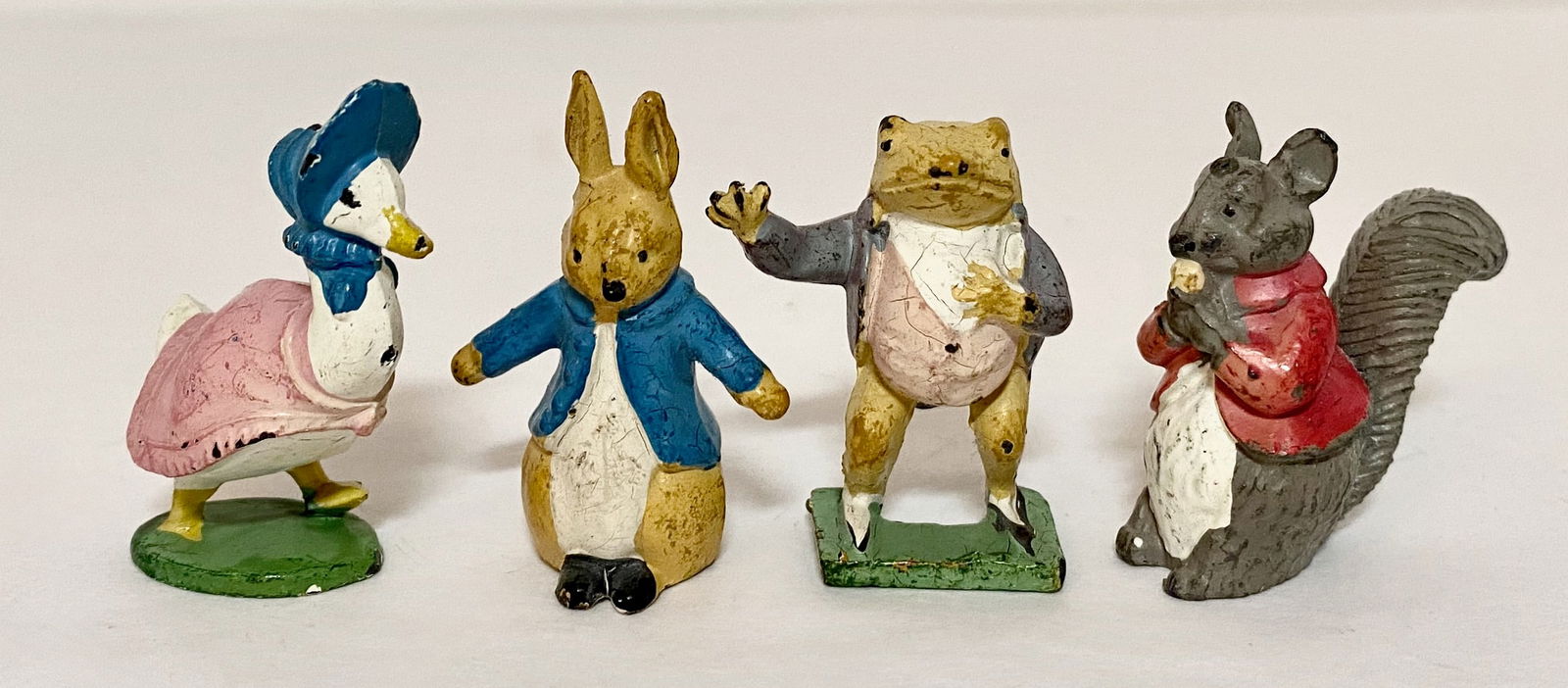 Timpo RARE Beatrix Potter Set: Peter Rabbit, Nutkin Squirrel, Jermima Puddle Duck, and Jeremy Fisher. 4 Pieces. Excellent condition. Unboxed.