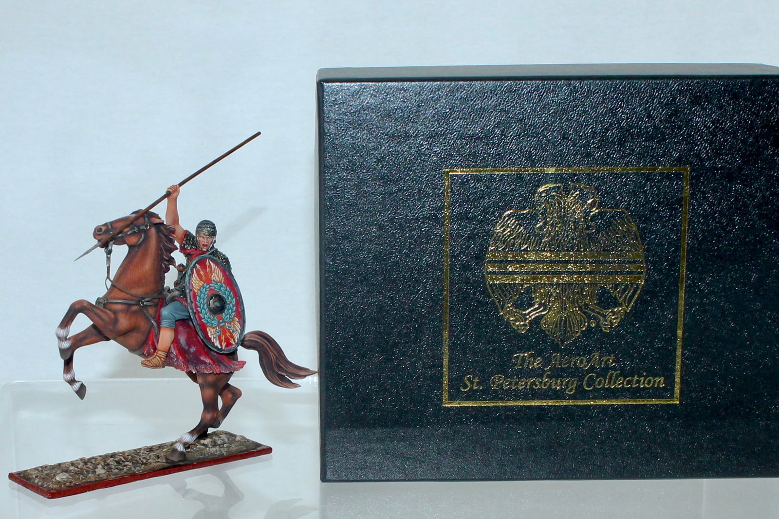 Aero Art Roman Auxiliary Cavalryman: St. Petersburg Collection. In Chain Mail with Spear. 6111 on Underside of Base. 1 Piece. Condition Very Good to Excellent. Some Paint Oxidation. Paint Crackling on Underside of Base. Box Very Good.